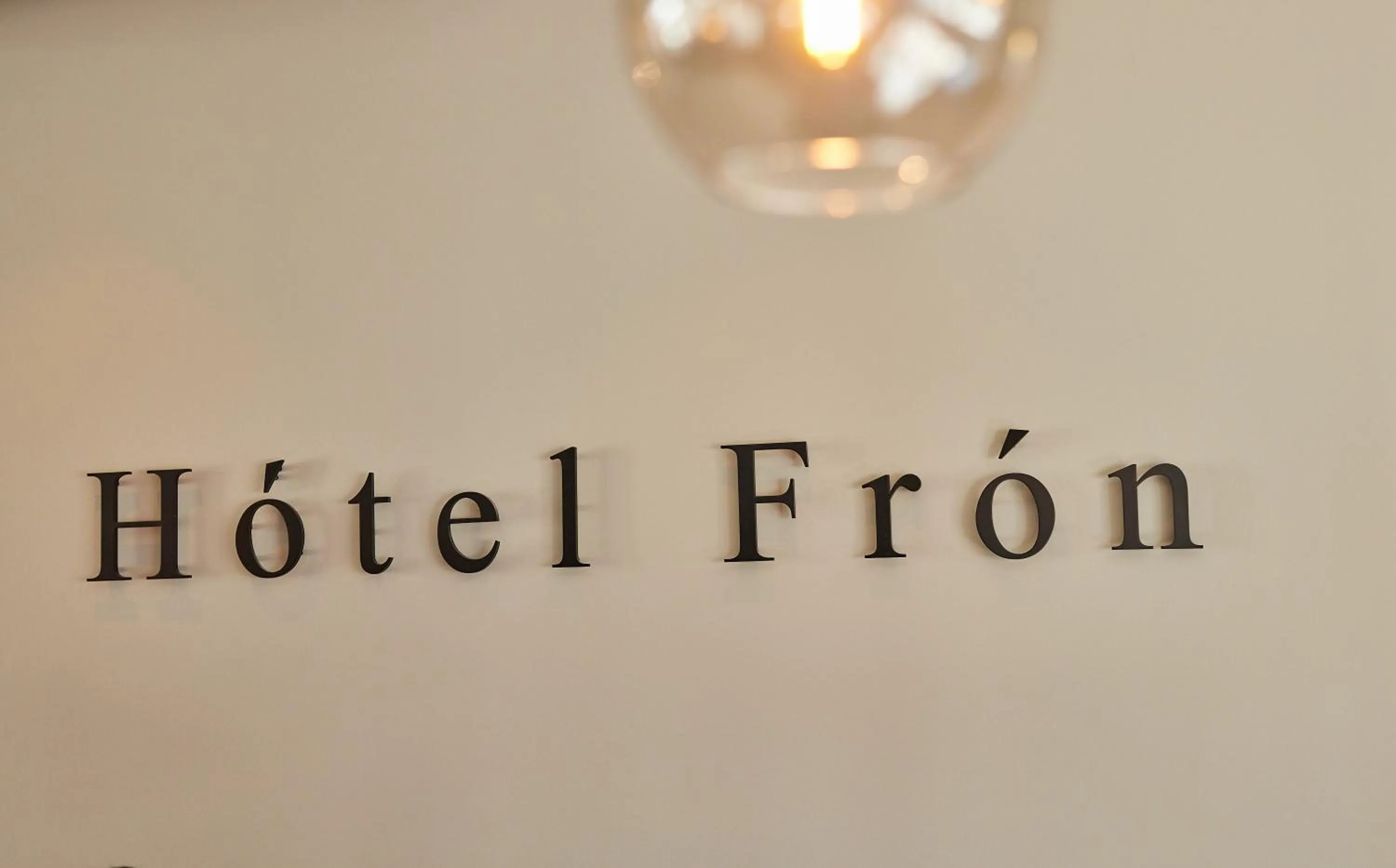 Property logo or sign in Hotel Frón