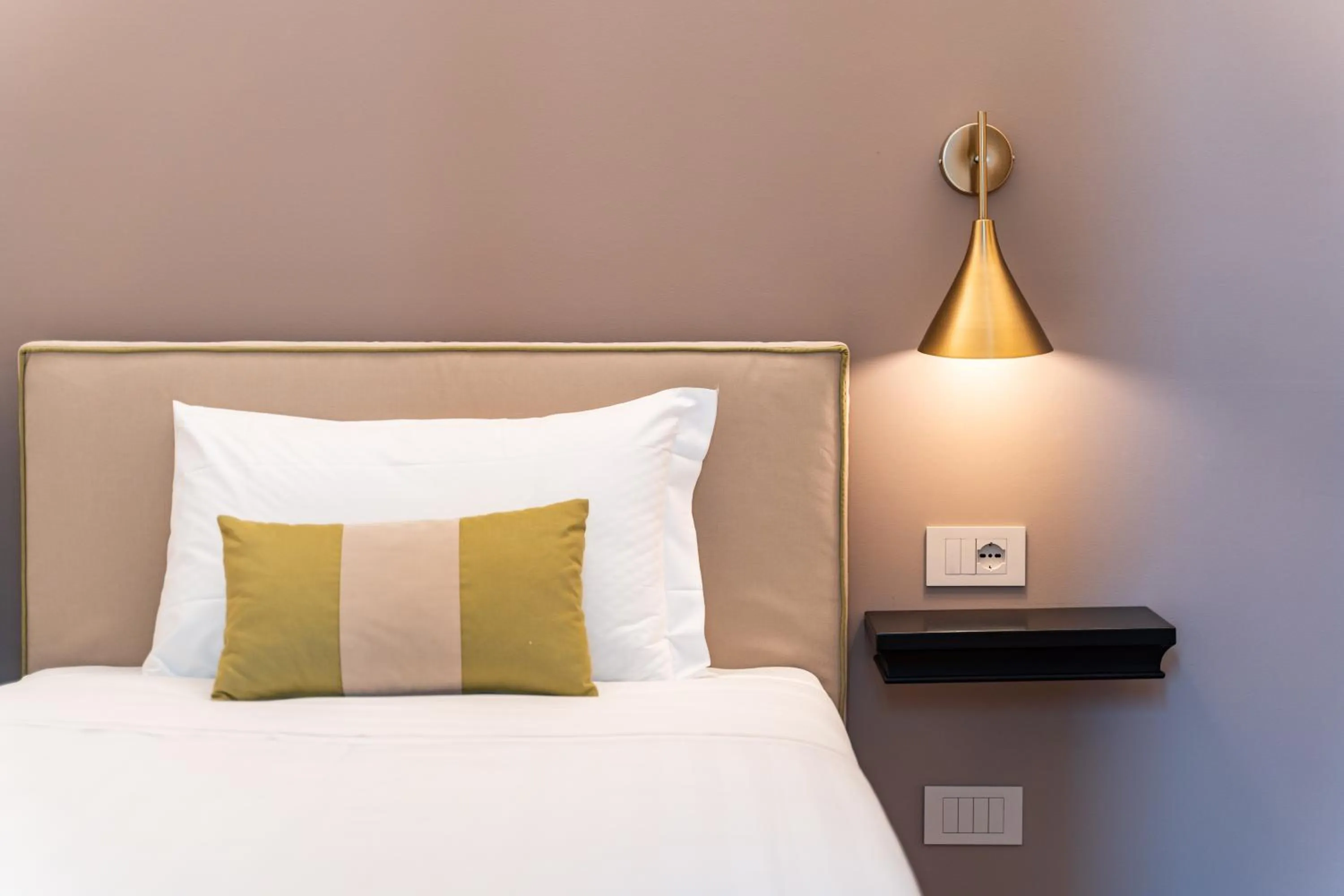 Bed in Hotel del Conte