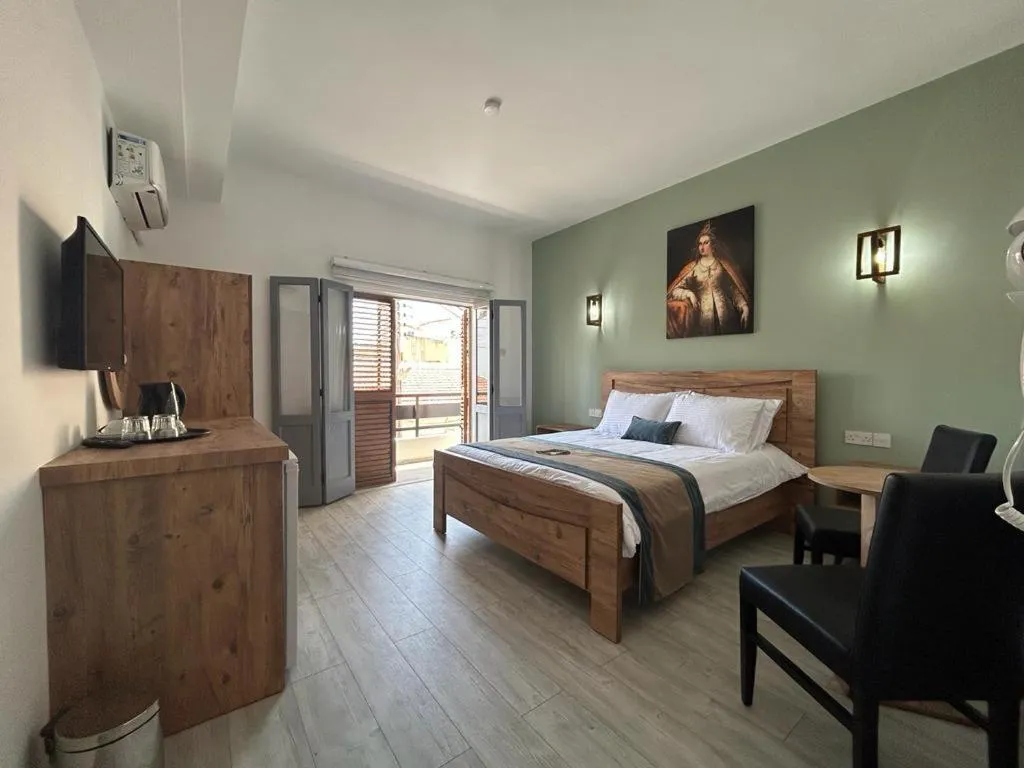 Bed in Royal Goddess Guest House, Walled City