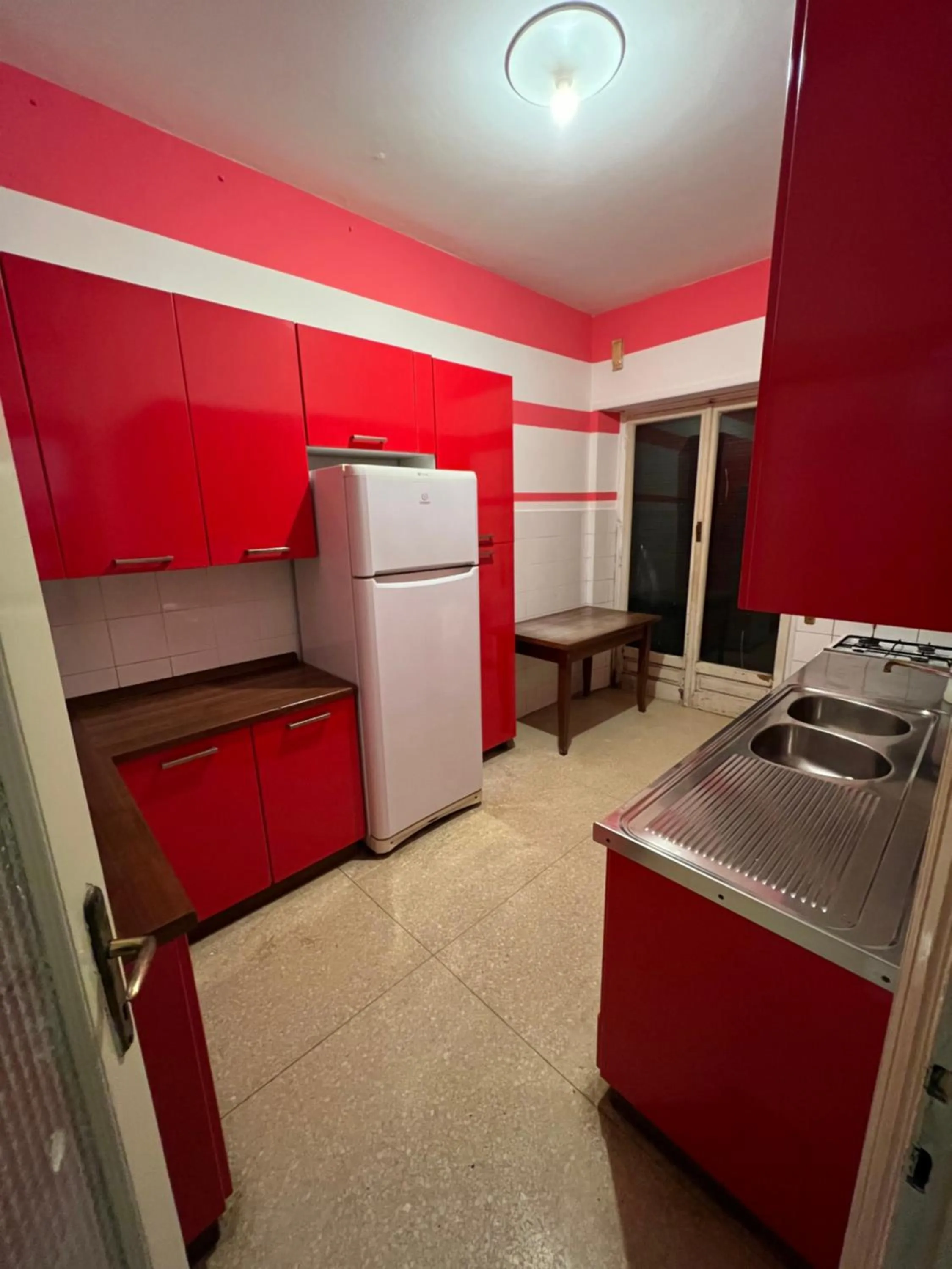 Kitchen or kitchenette in Albergo Royal Genova