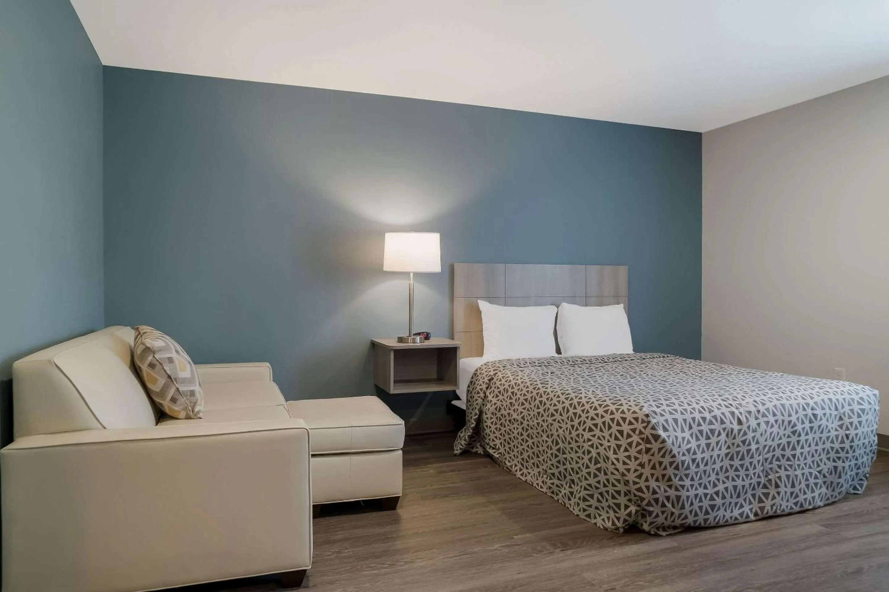 Bedroom, Bed in WoodSpring Suites Detroit Sterling Heights