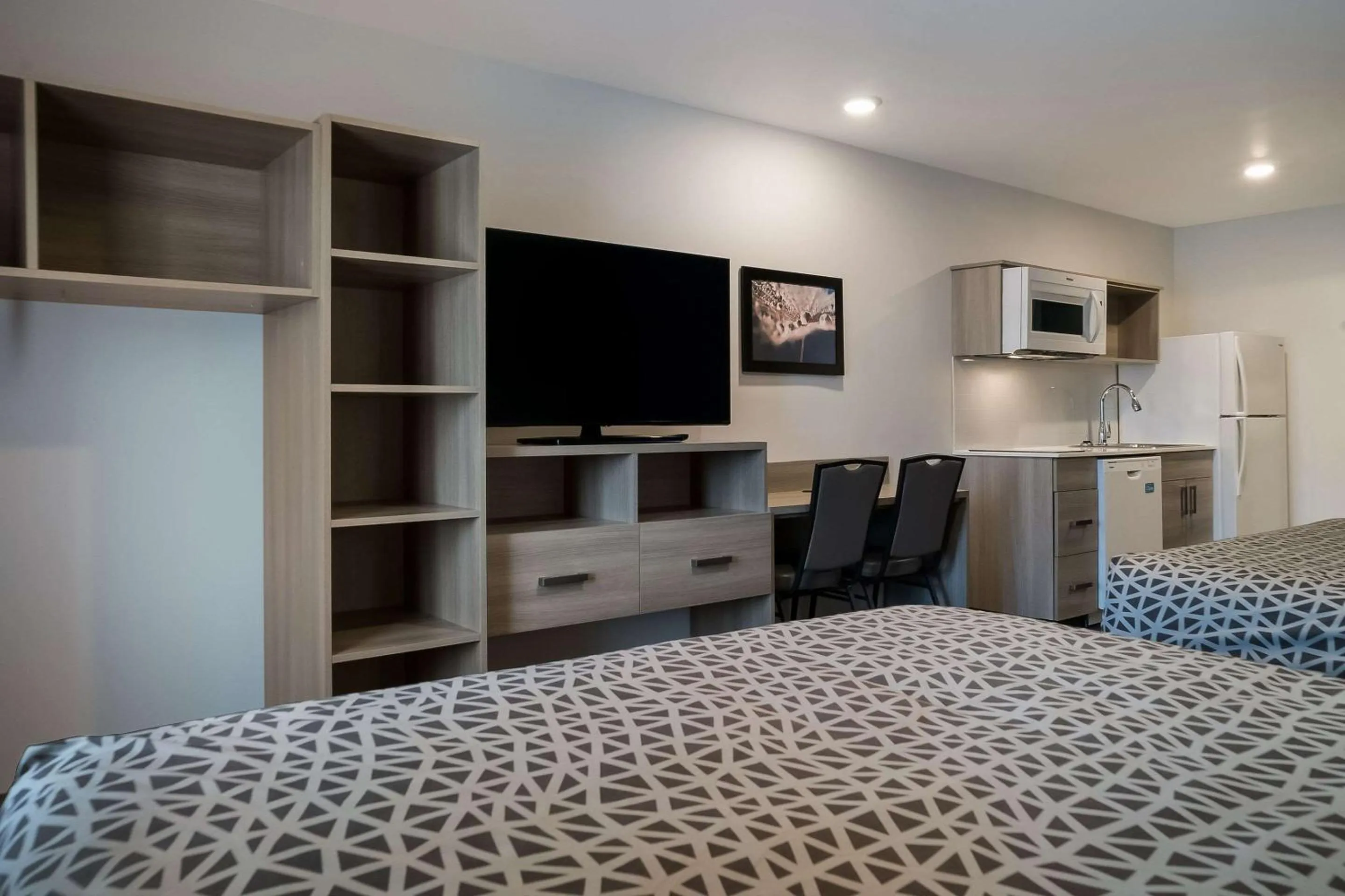 Bedroom, Bed in WoodSpring Suites Detroit Sterling Heights