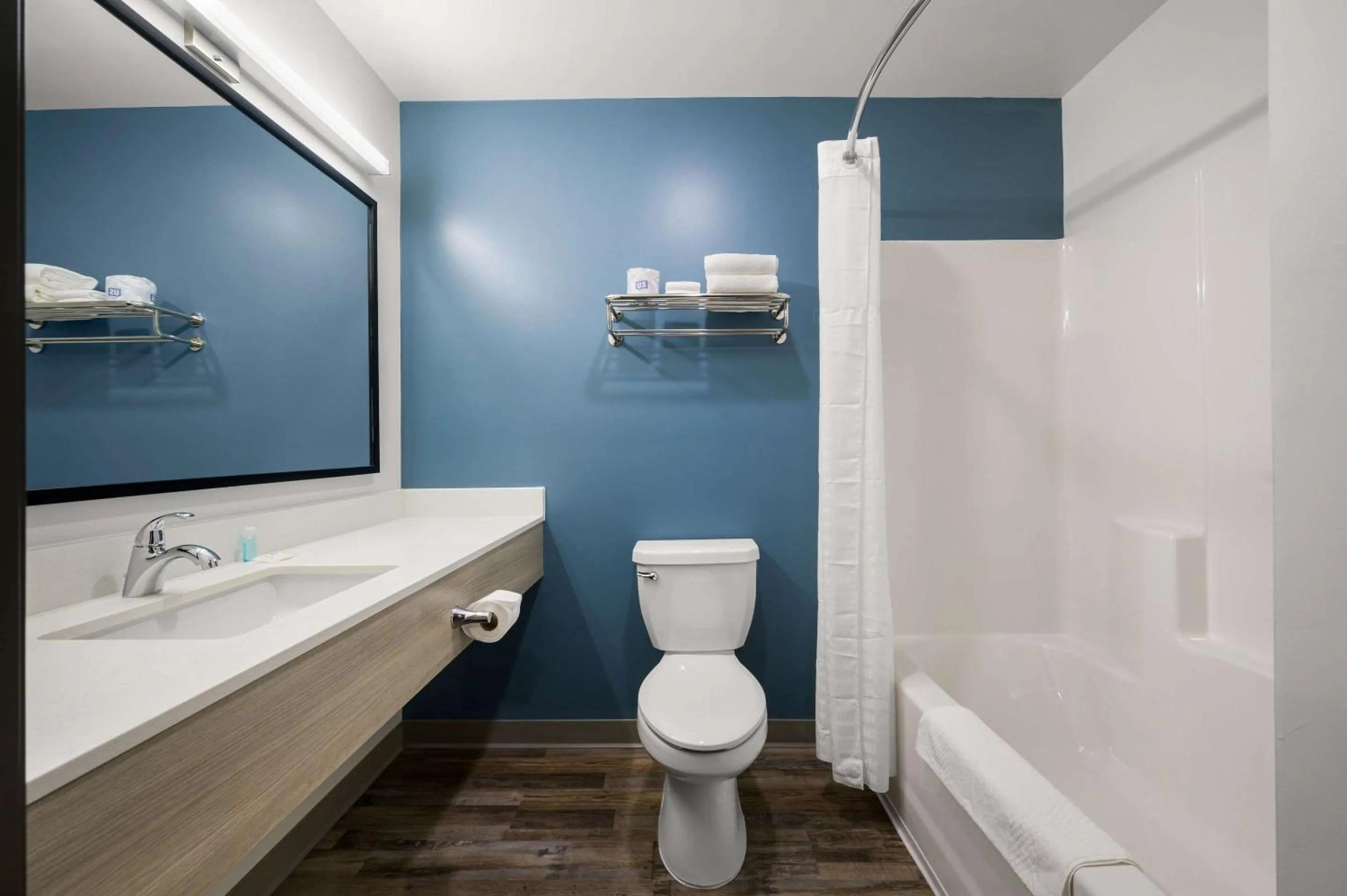 Shower in WoodSpring Suites Dearborn Detroit