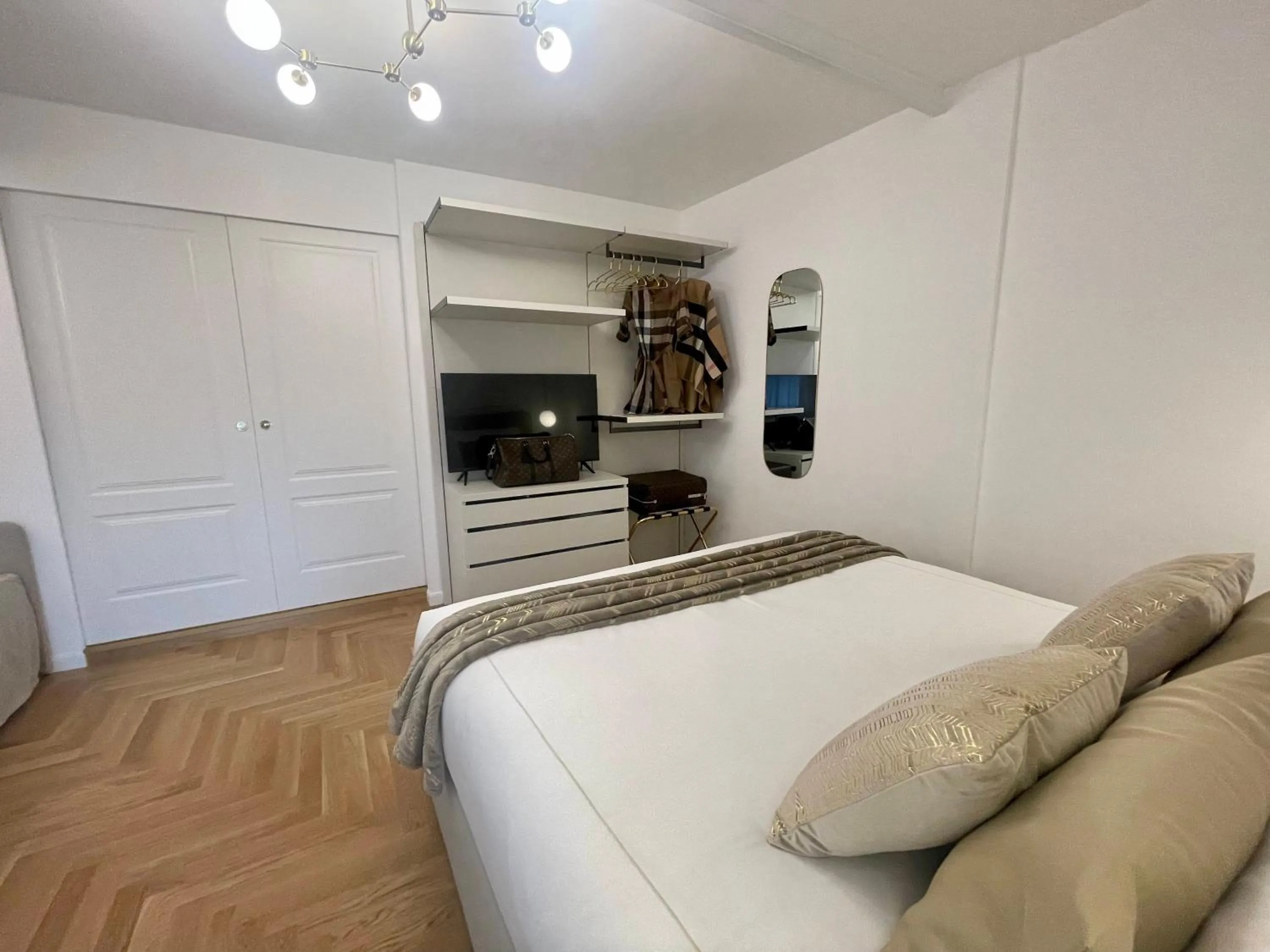 Bed in Bellagio Luxury Suites Apartments