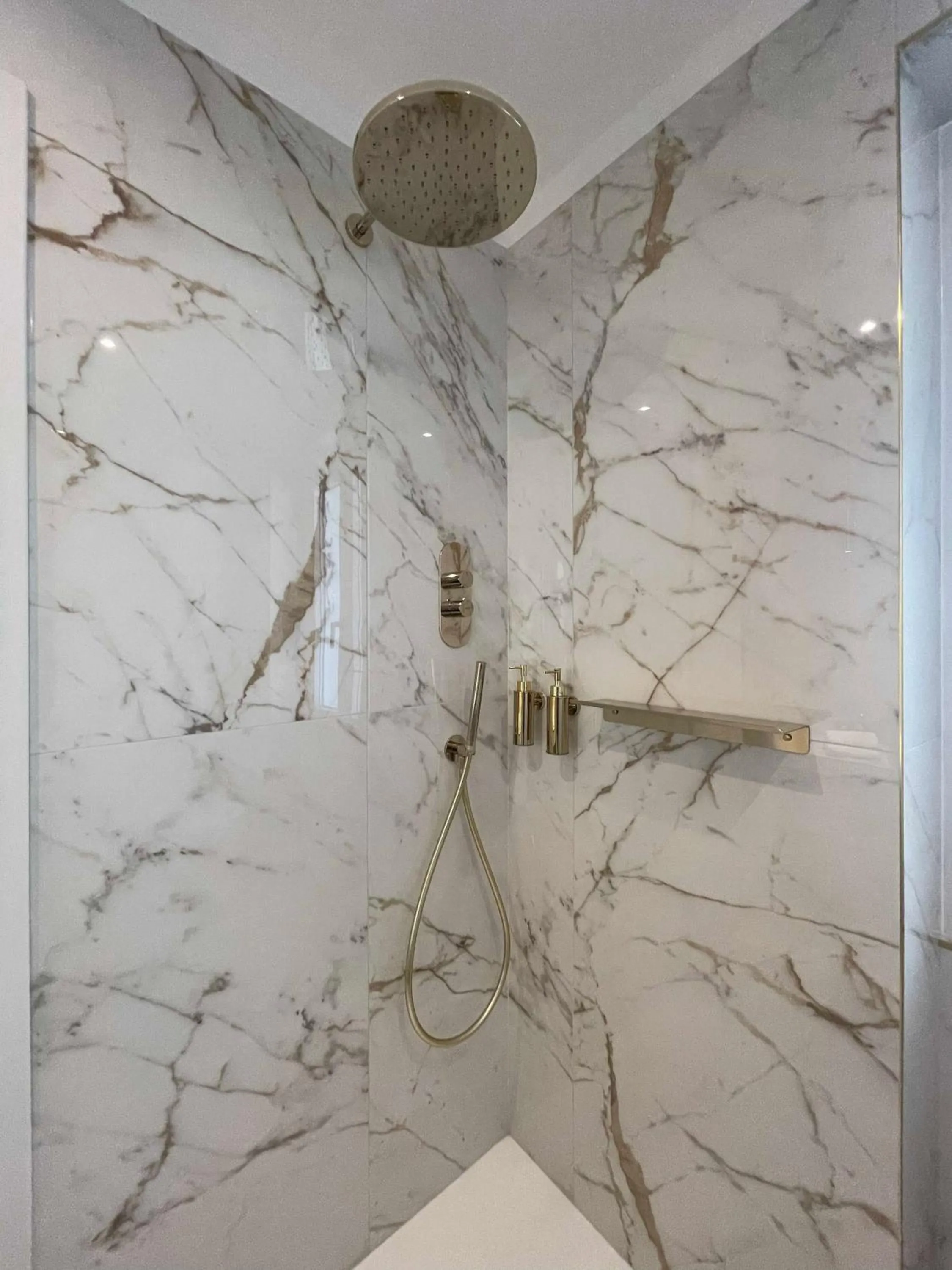 Shower in Bellagio Luxury Suites Apartments