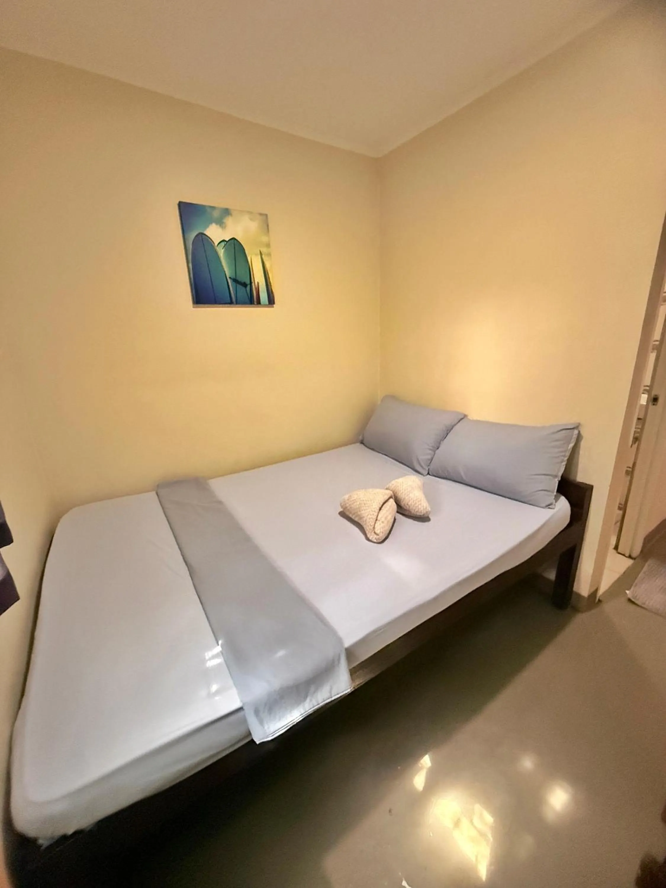 Bed in AA Jungle Guesthouse Deluxe