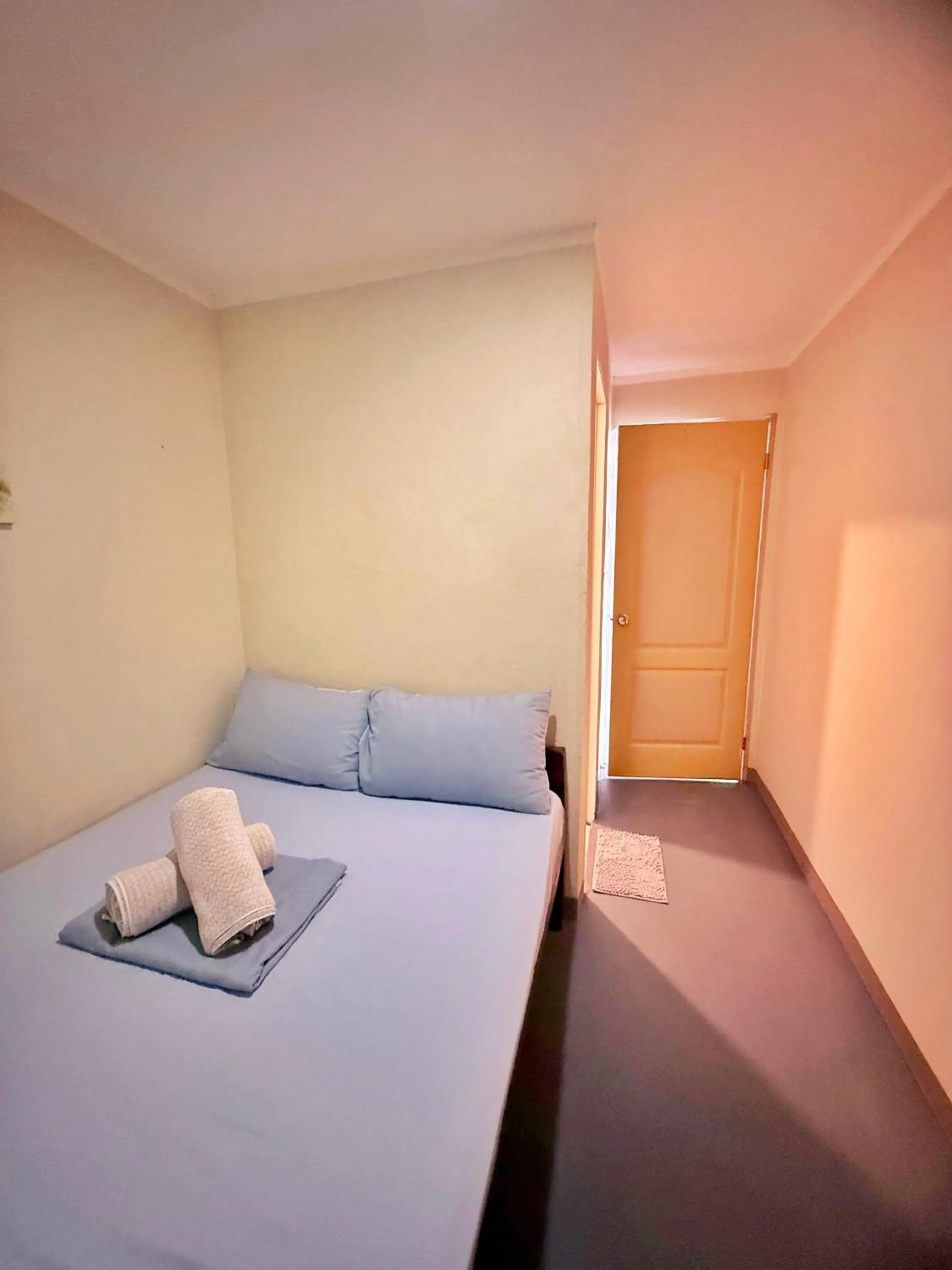 Bed in AA Jungle Guesthouse Deluxe