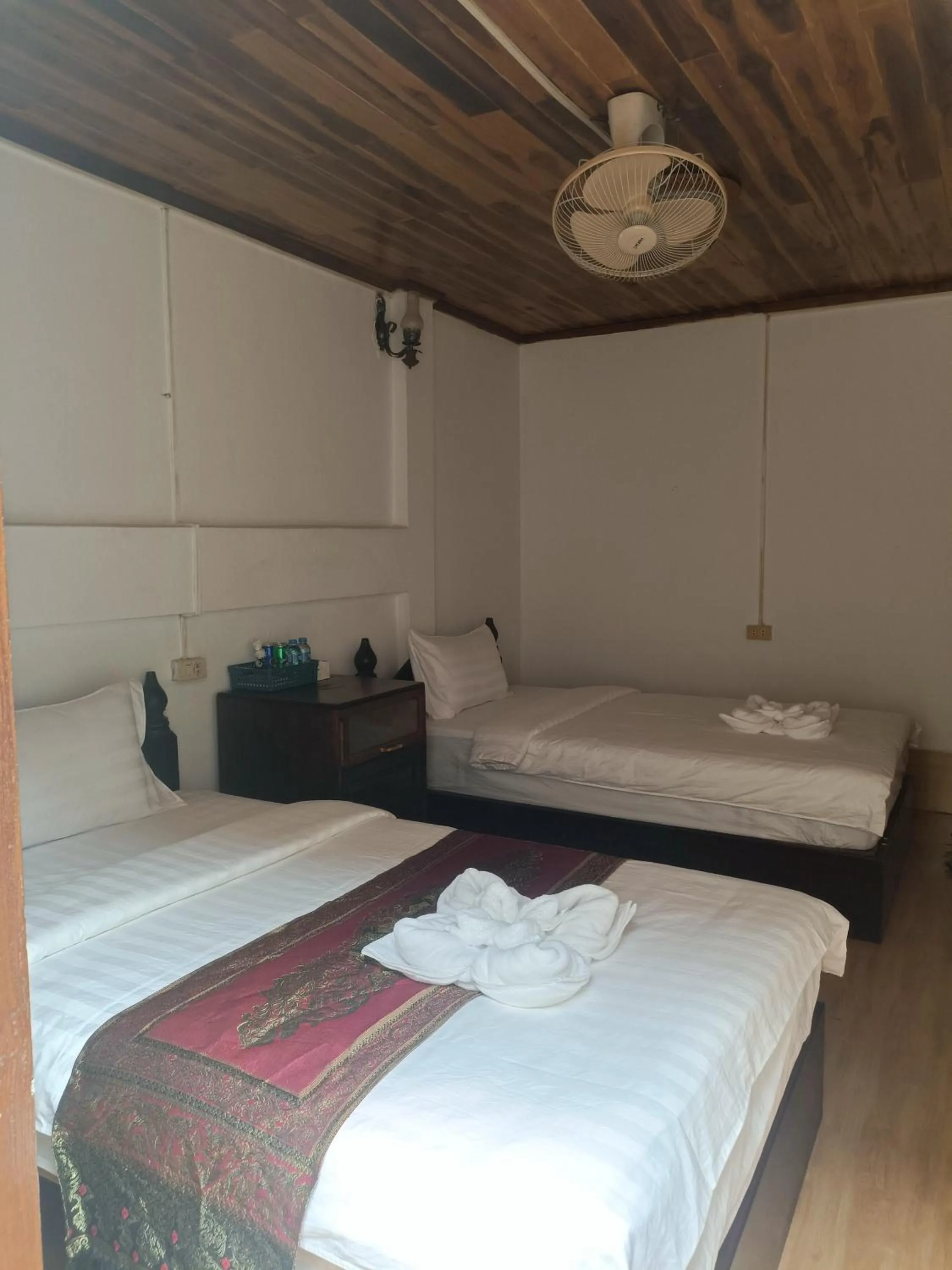 Bed in KONGKHAM GUESTHOUSE