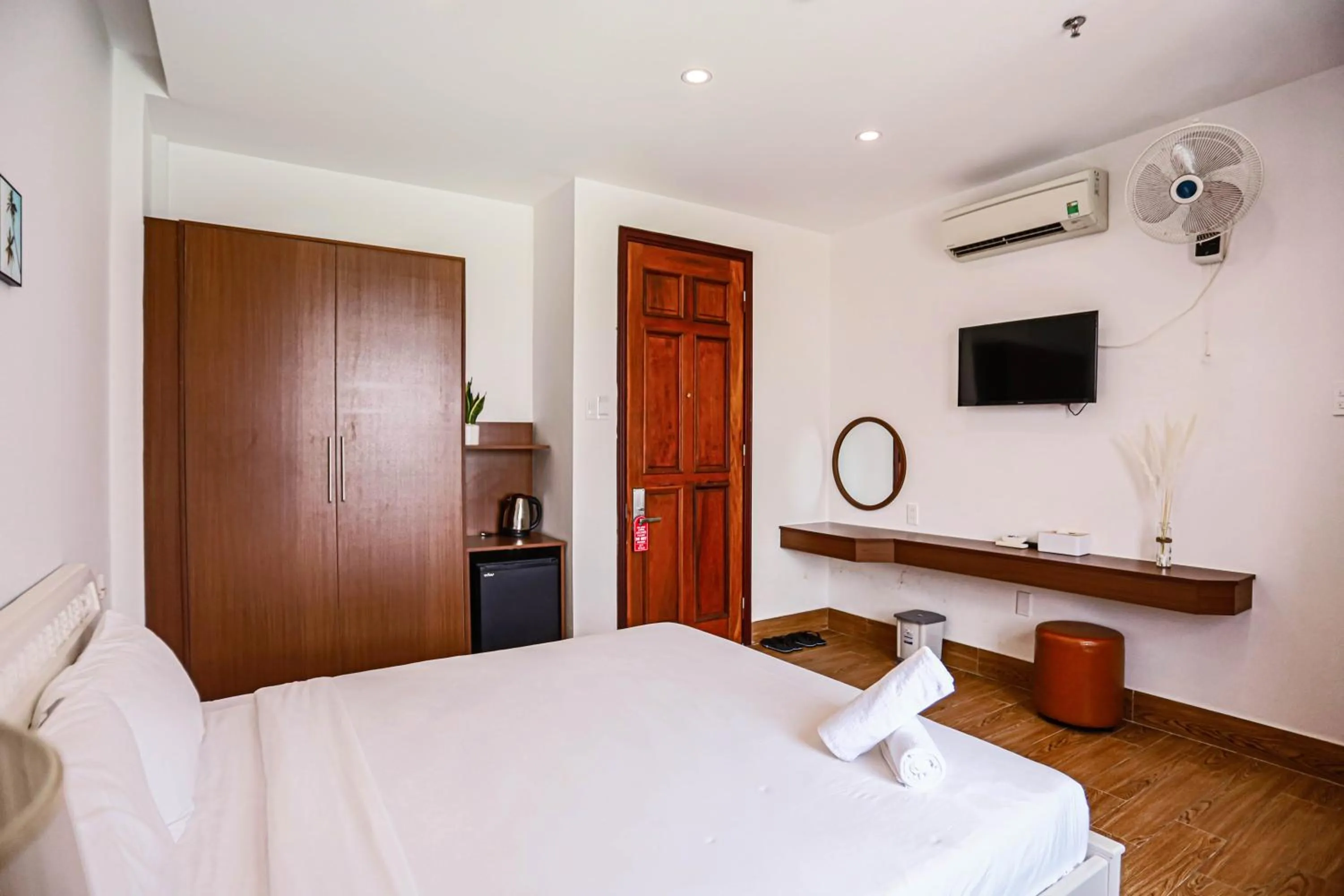 fireplace, Bed in SeaColor Beachstay Danang Hotel by Haviland