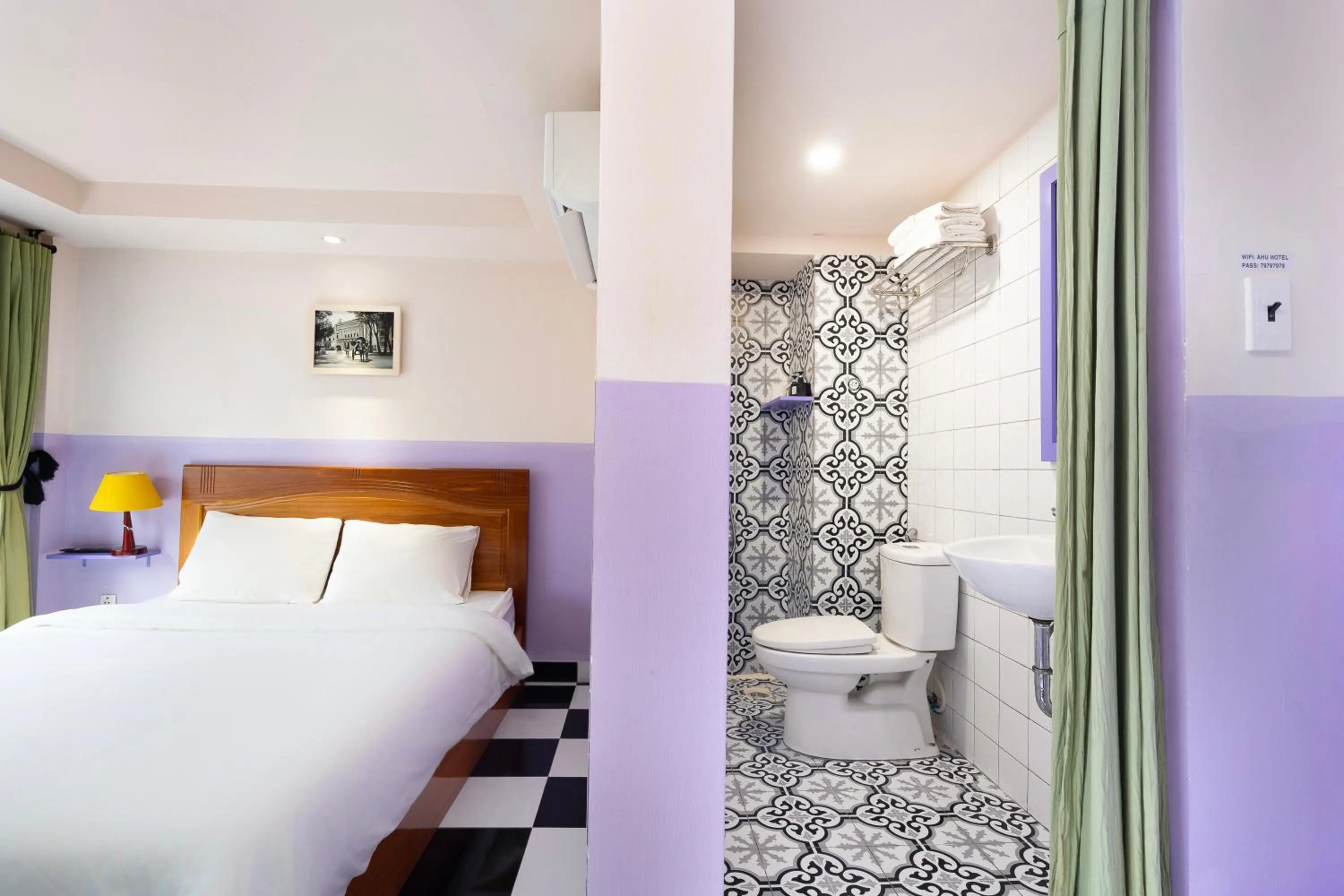 Bed in Ahu Hotel & Apartment