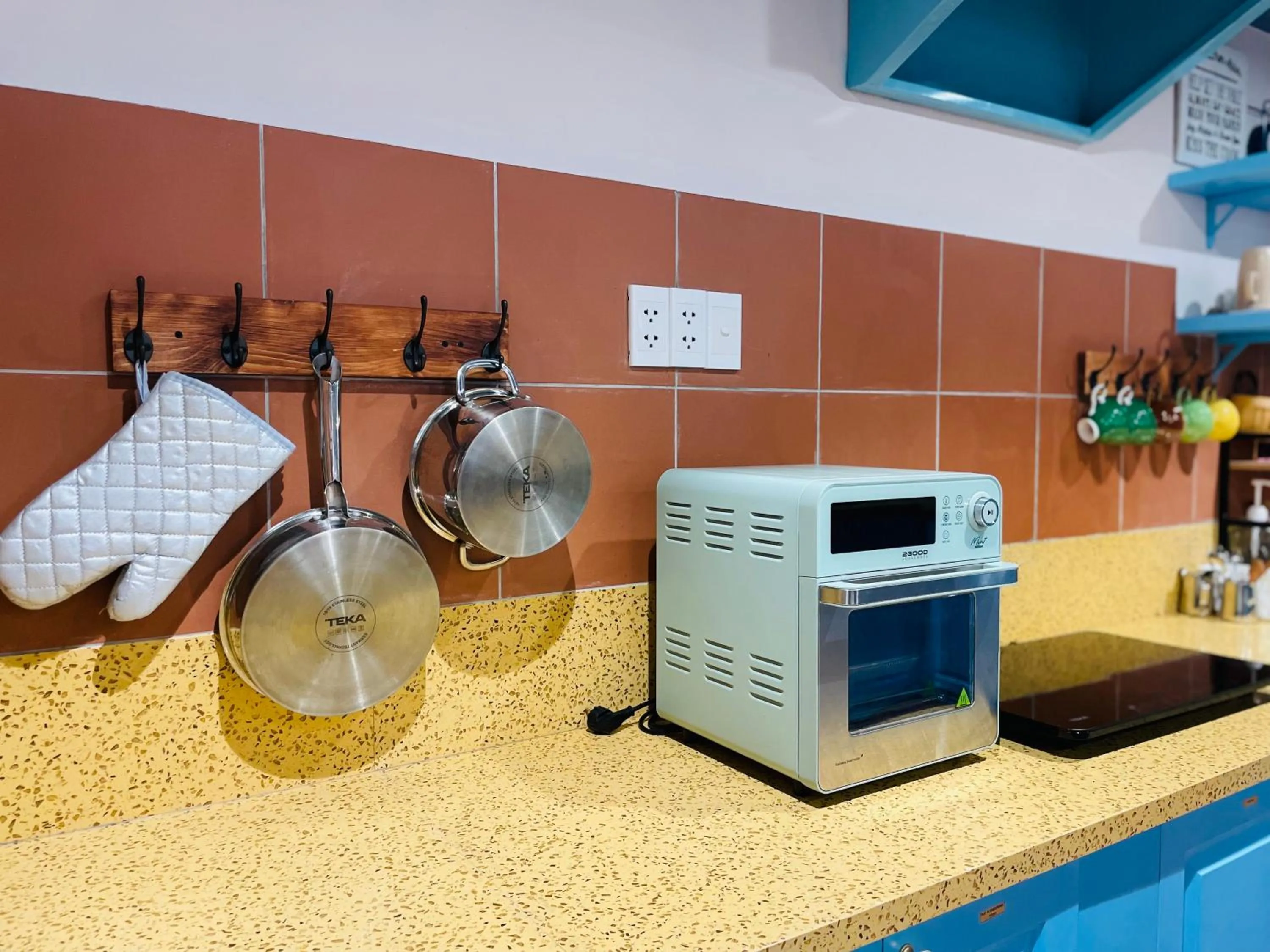 Kitchen or kitchenette in Ahu Hotel & Apartment