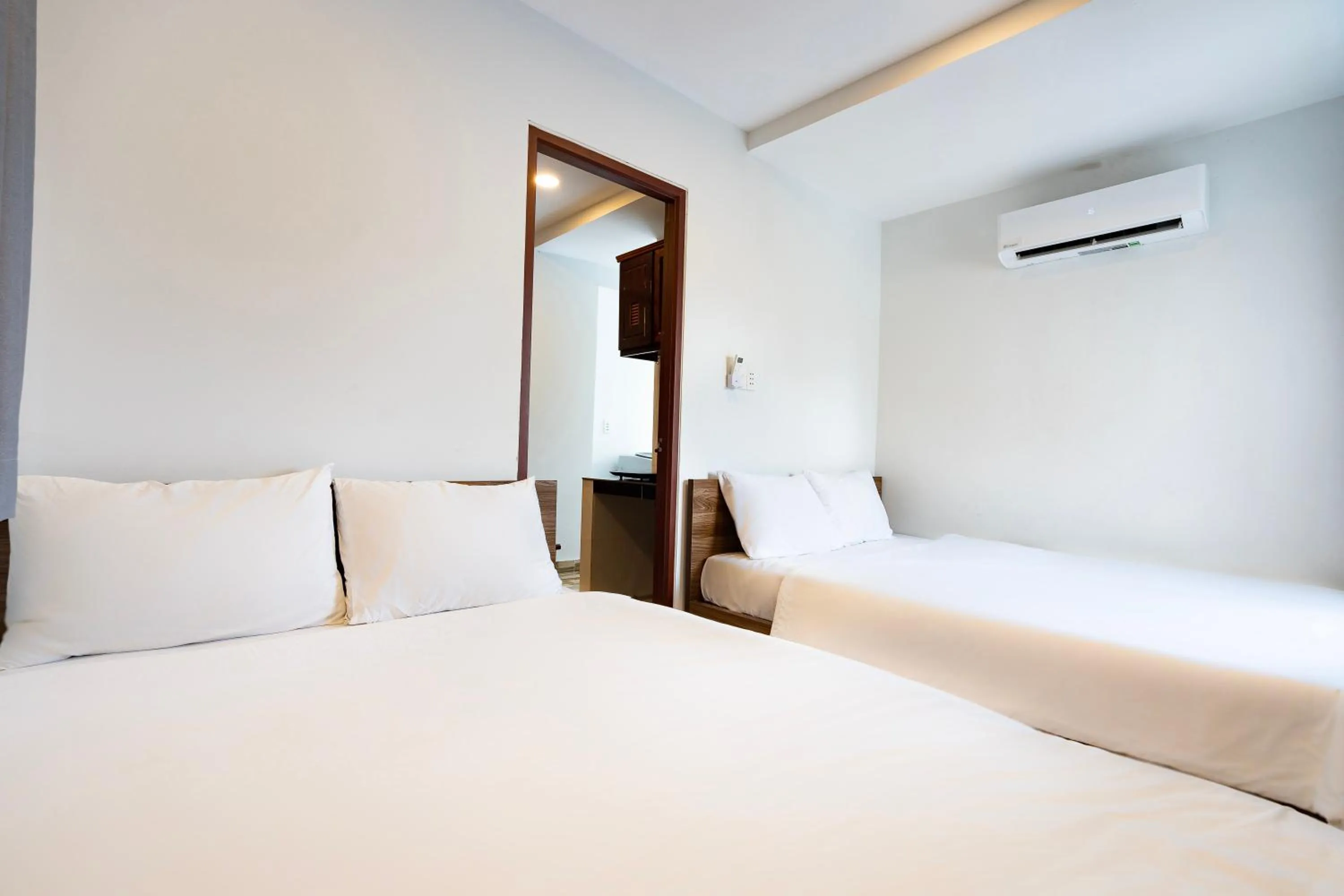 Bed in Ahu Hotel & Apartment