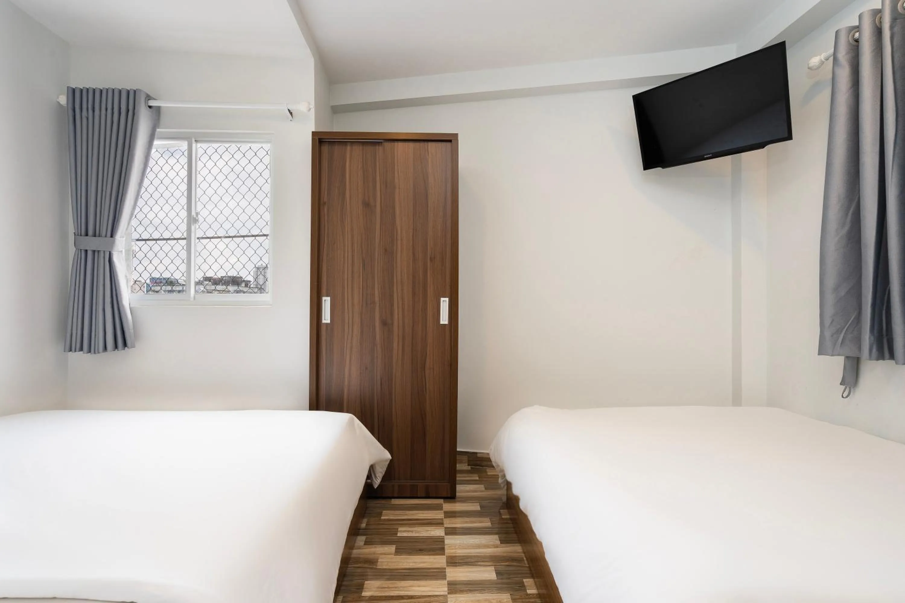 Bed in Ahu Hotel & Apartment