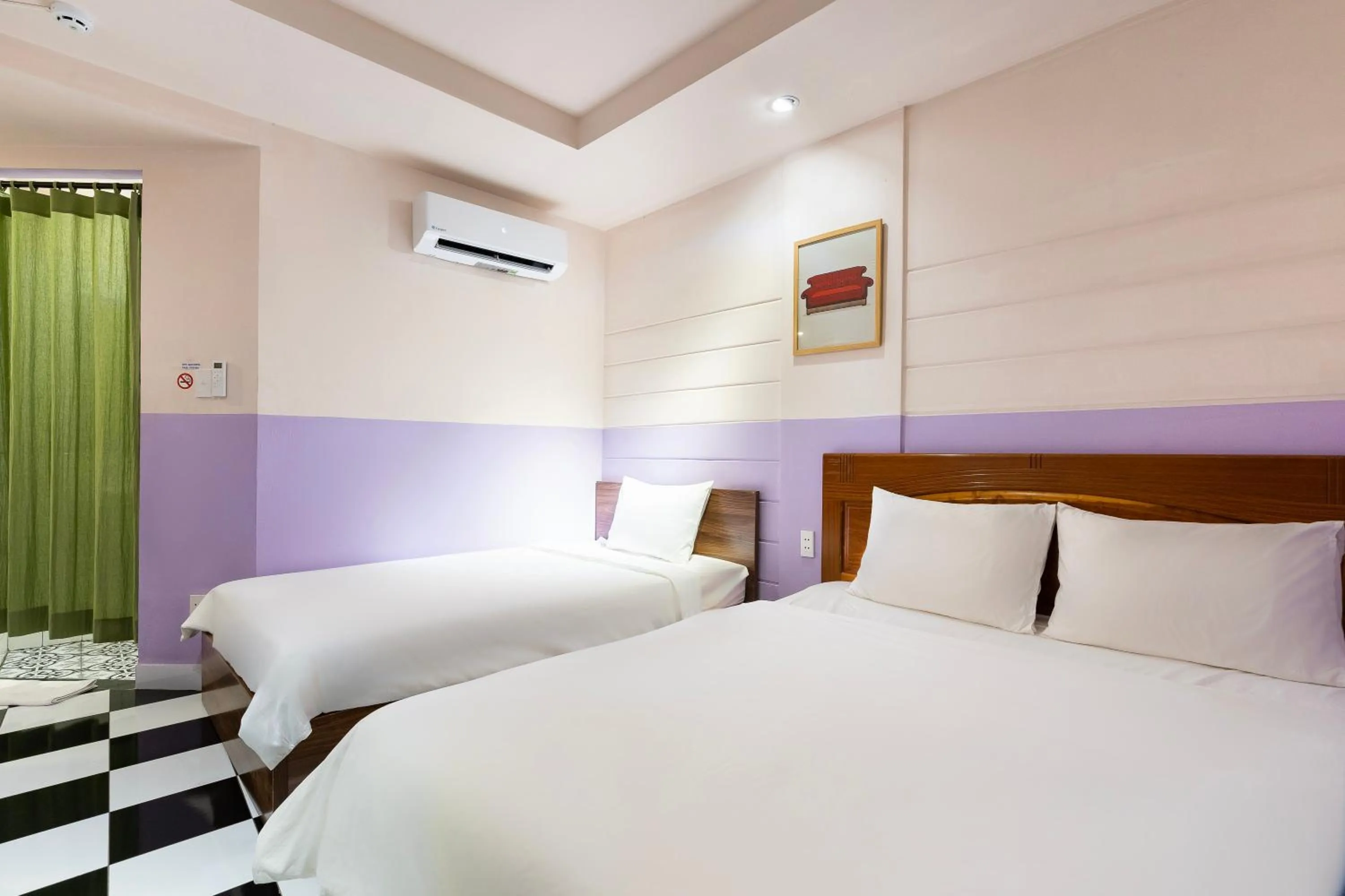 Bed in Ahu Hotel & Apartment