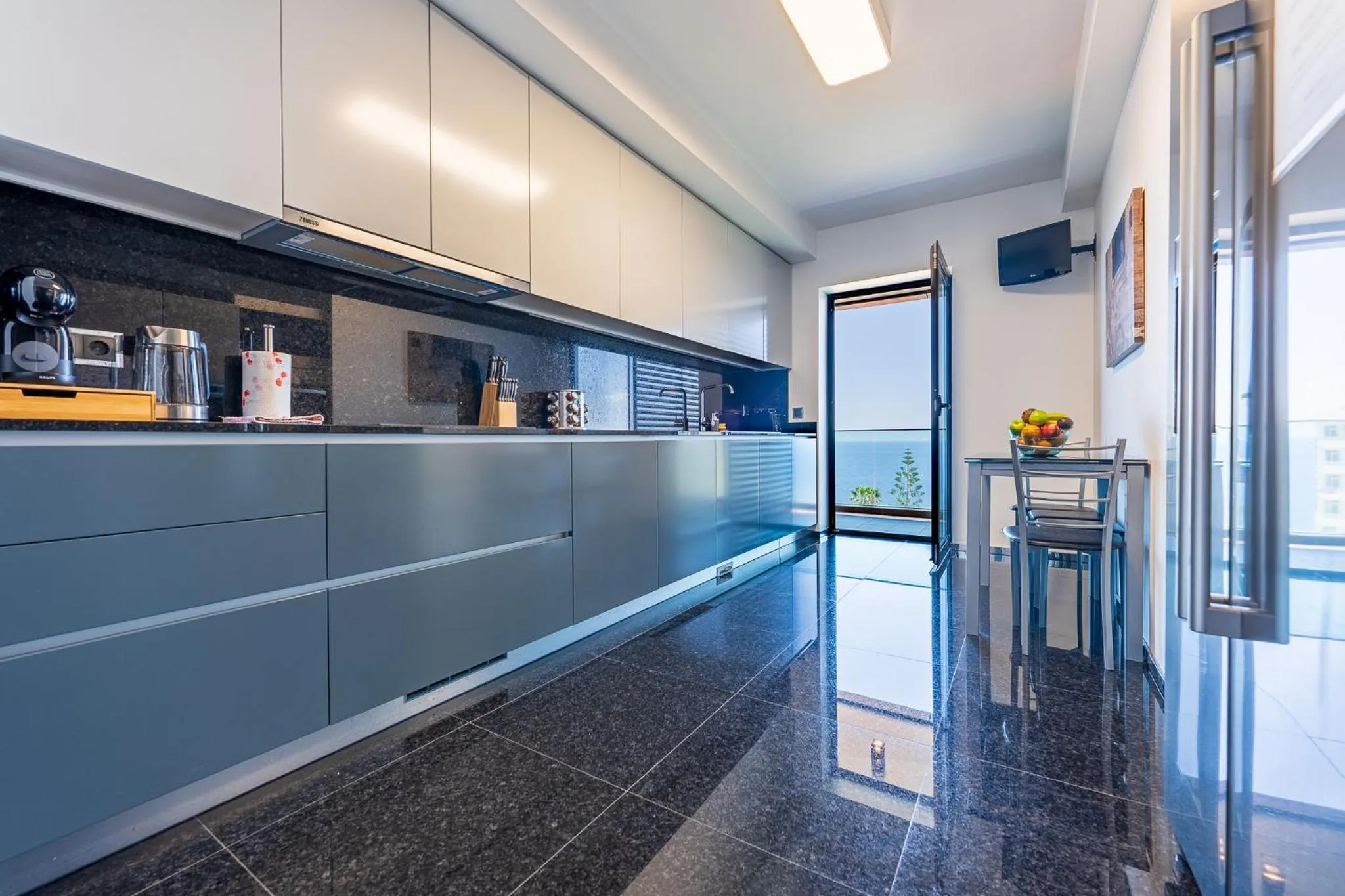 Kitchen or kitchenette in Serenity by the Sea