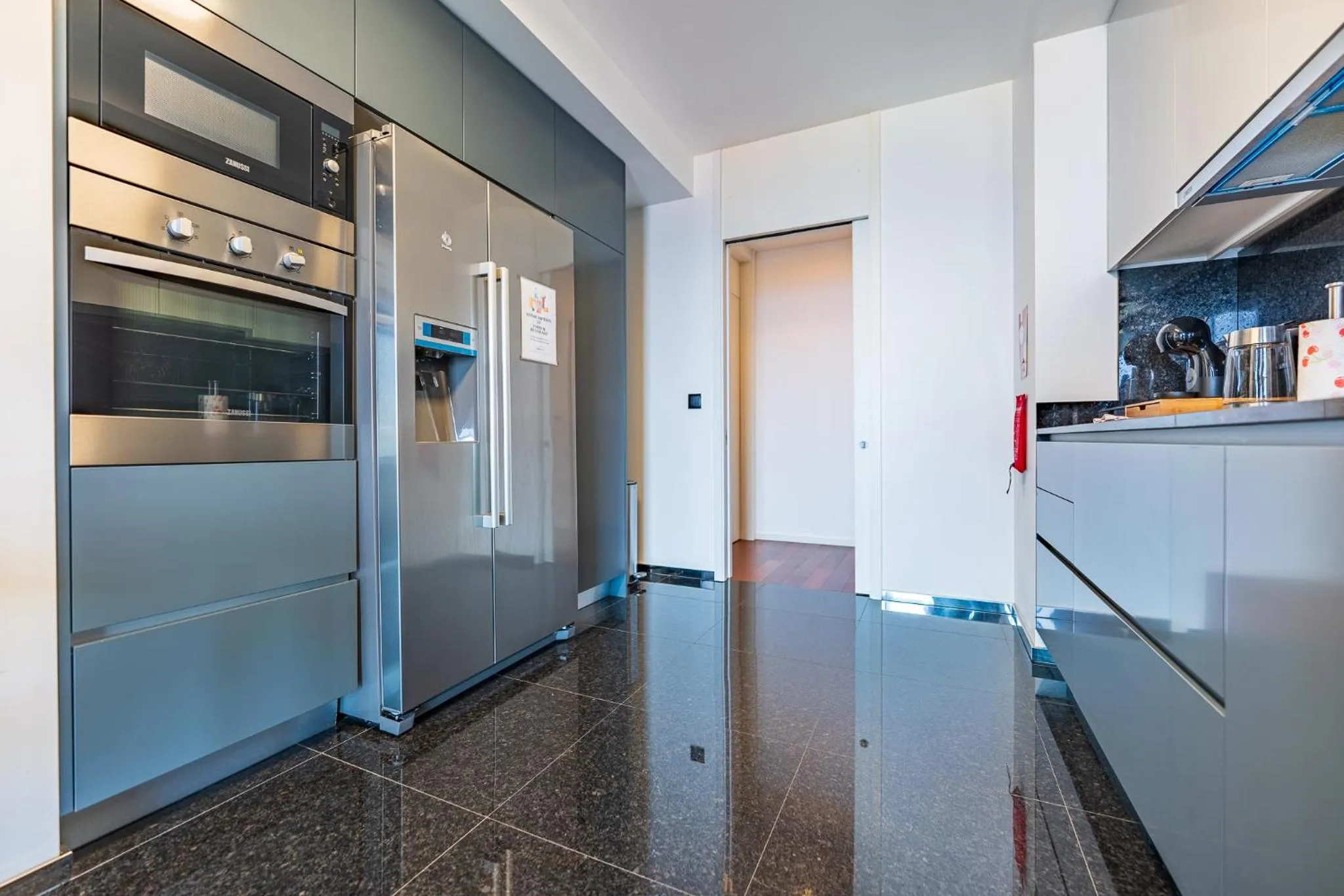 Kitchen or kitchenette in Serenity by the Sea