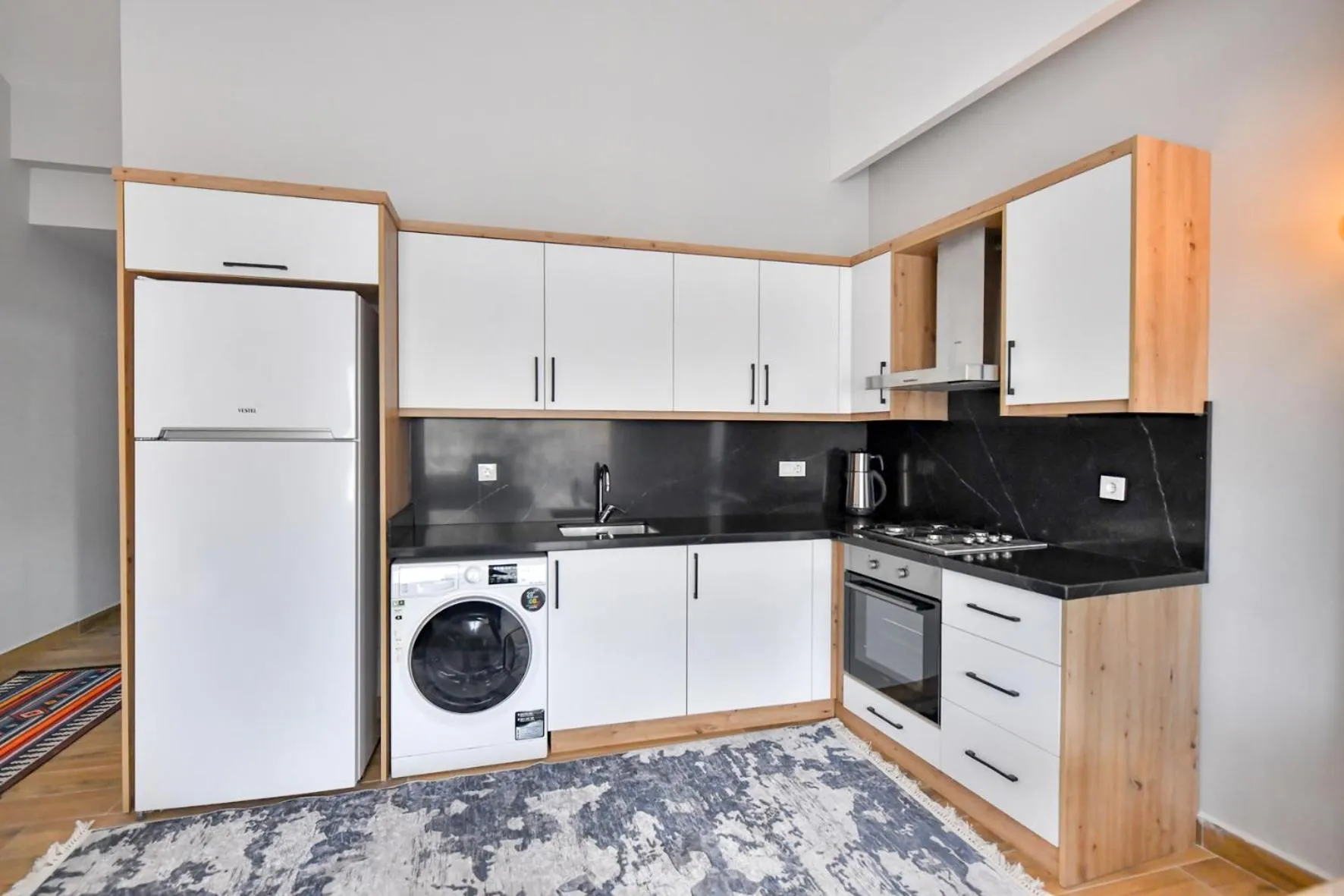Kitchen or kitchenette in RED MOON SUITES