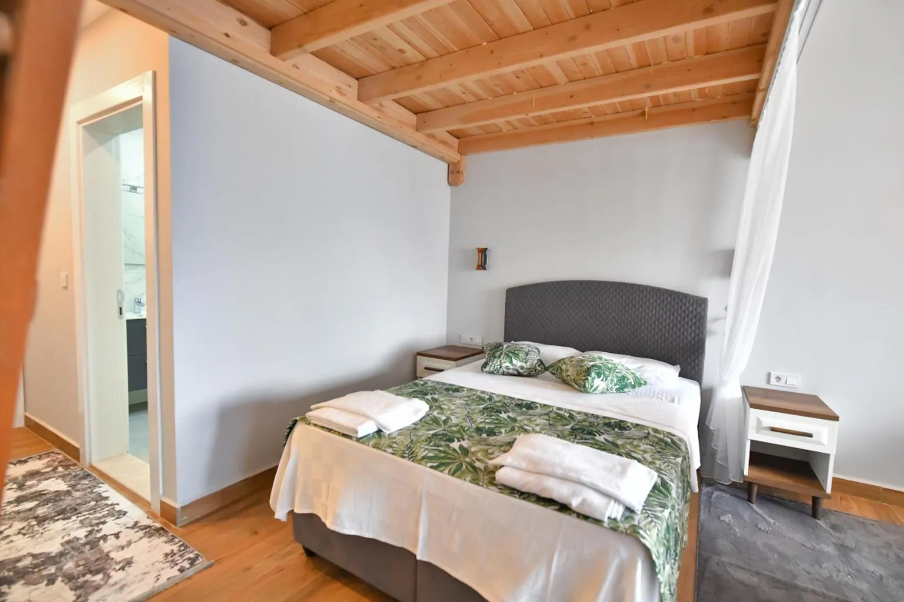 Bed in RED MOON SUITES