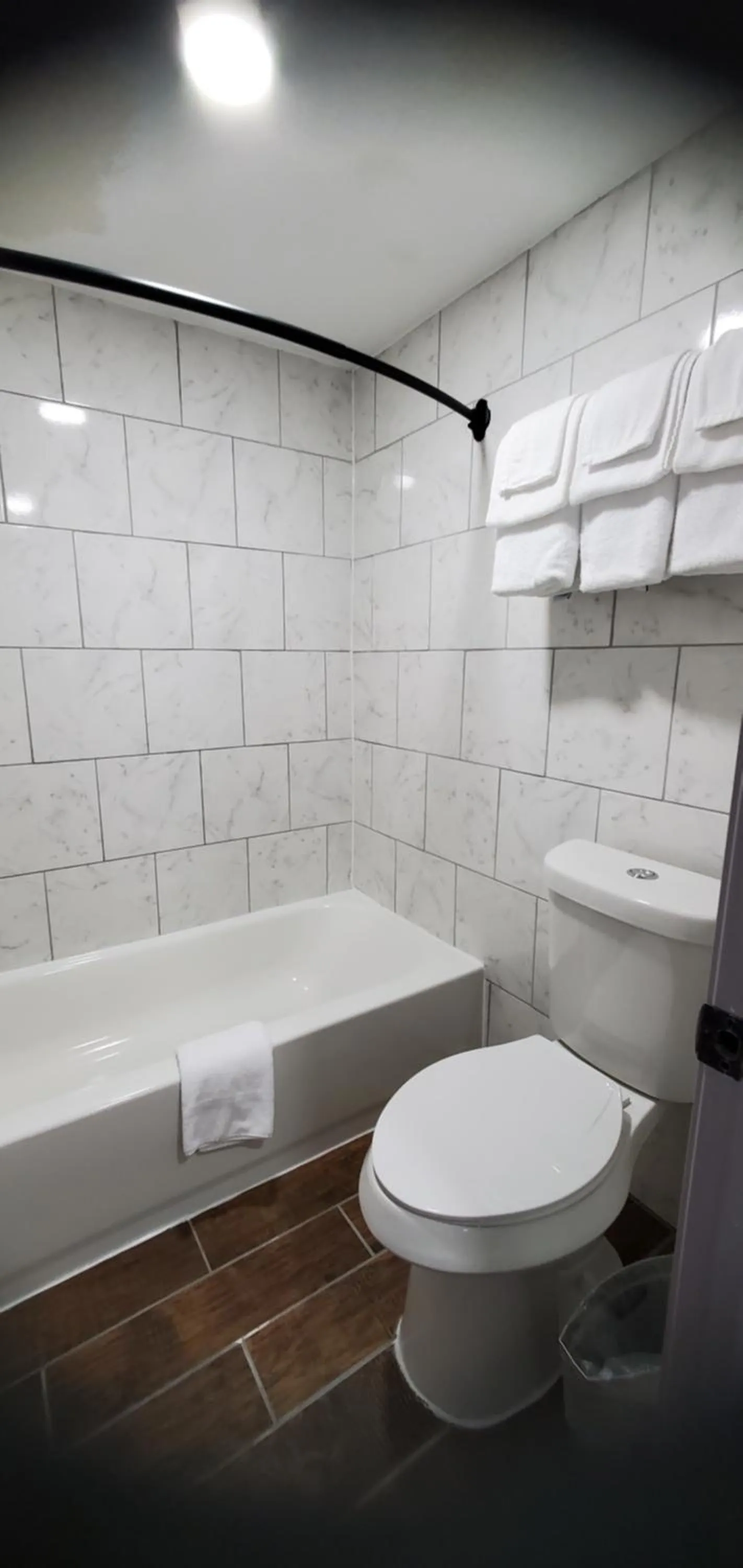 Bathroom in Travelodge by Wyndham Livonia Canton Novi Detroit Area