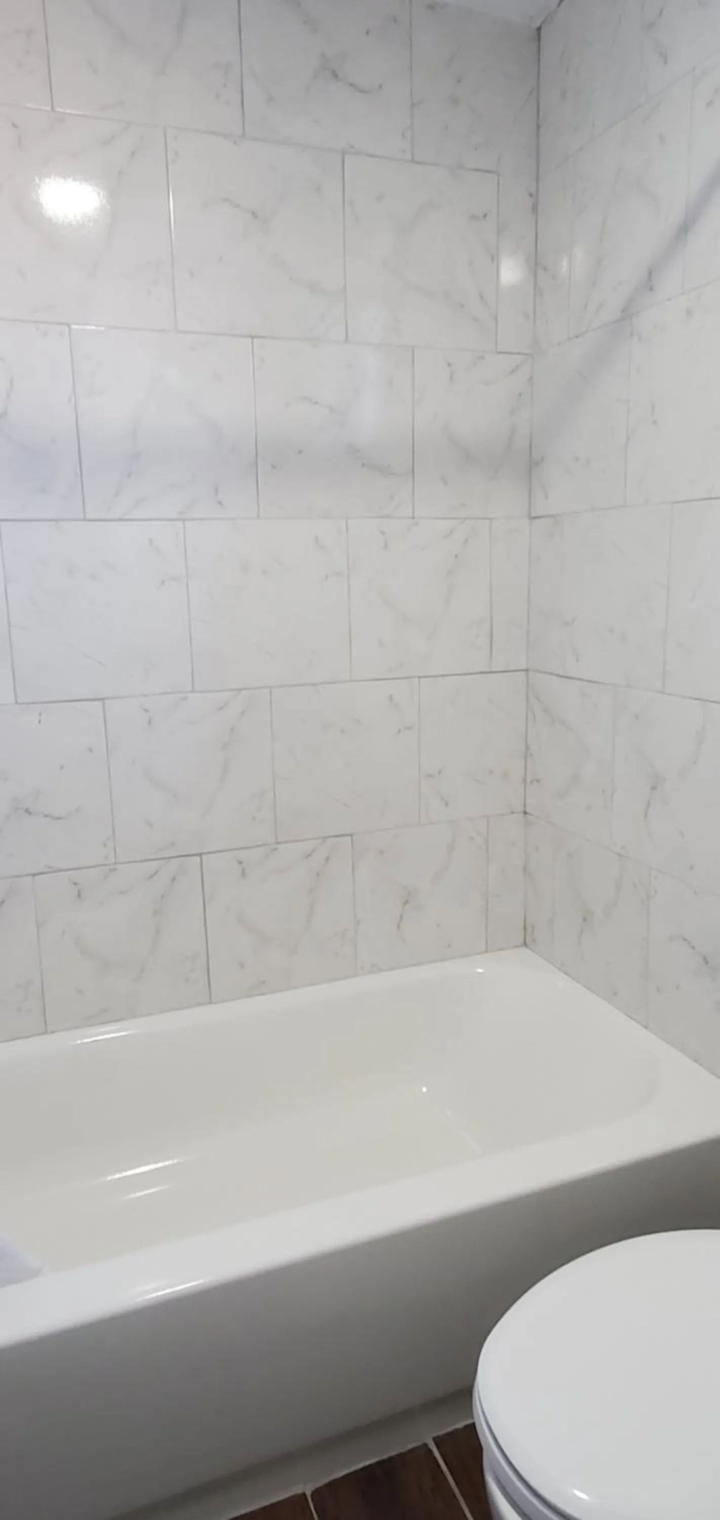 Bathroom in Travelodge by Wyndham Livonia Canton Novi Detroit Area