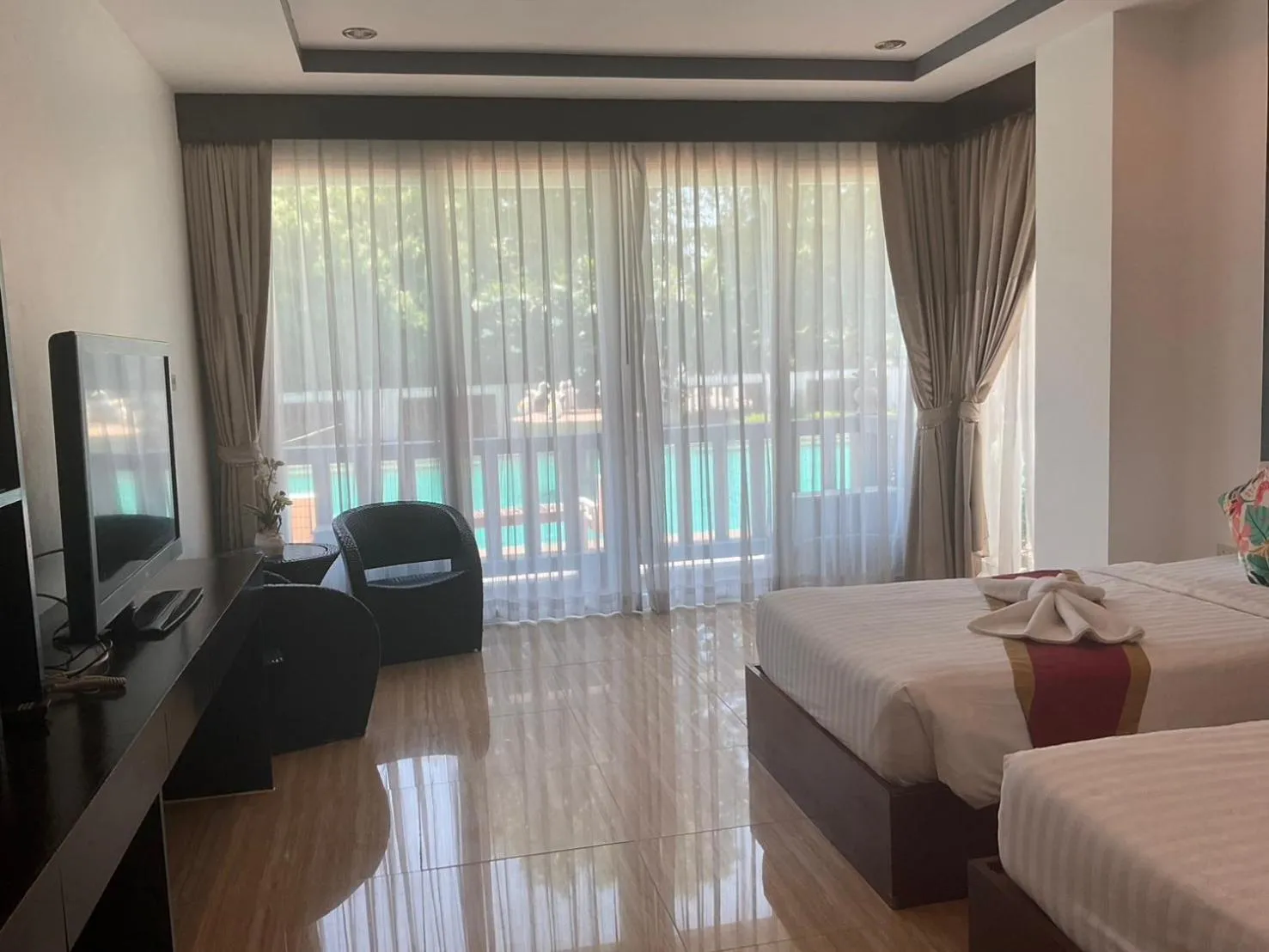 Communal lounge/ TV room, Bed in The Sand Beach Pattaya