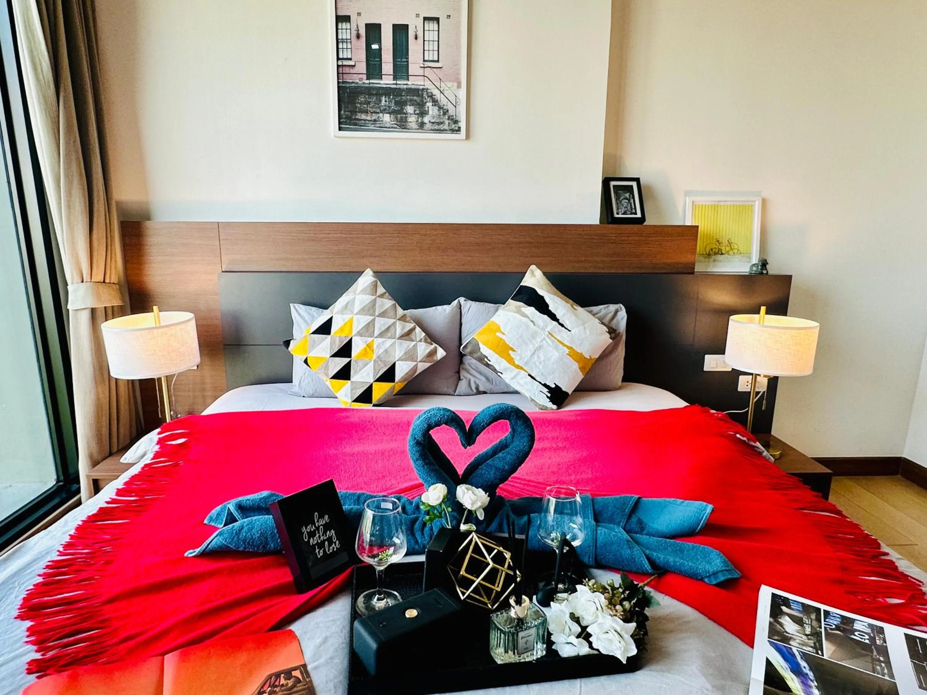 Bed in The Astra Condo Changkhlan in Chiang Mai