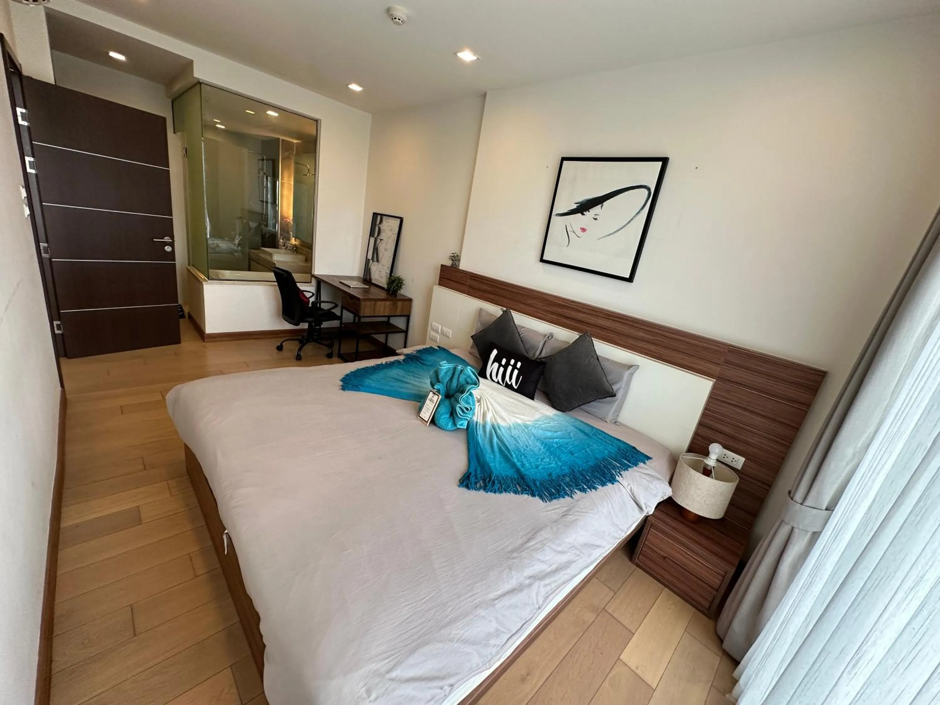 Bed in The Astra Condo Changkhlan in Chiang Mai