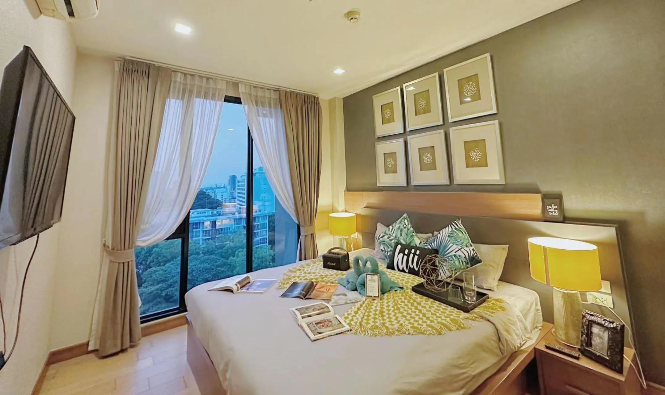 Bed in The Astra Condo Changkhlan in Chiang Mai