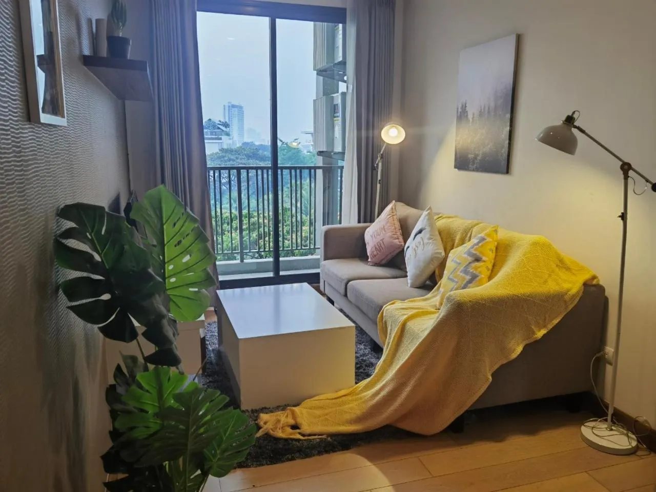 Bed in The Astra Condo Changkhlan in Chiang Mai