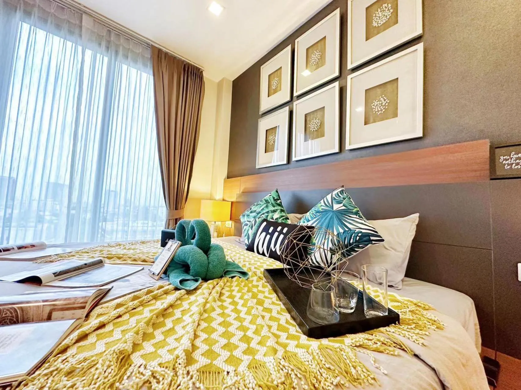 Bed in The Astra Condo Changkhlan in Chiang Mai