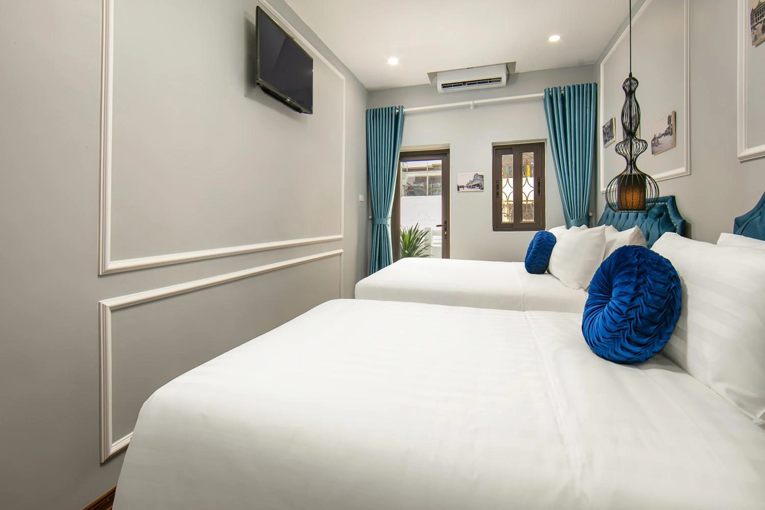 Bed in La Renta Hotel & Spa