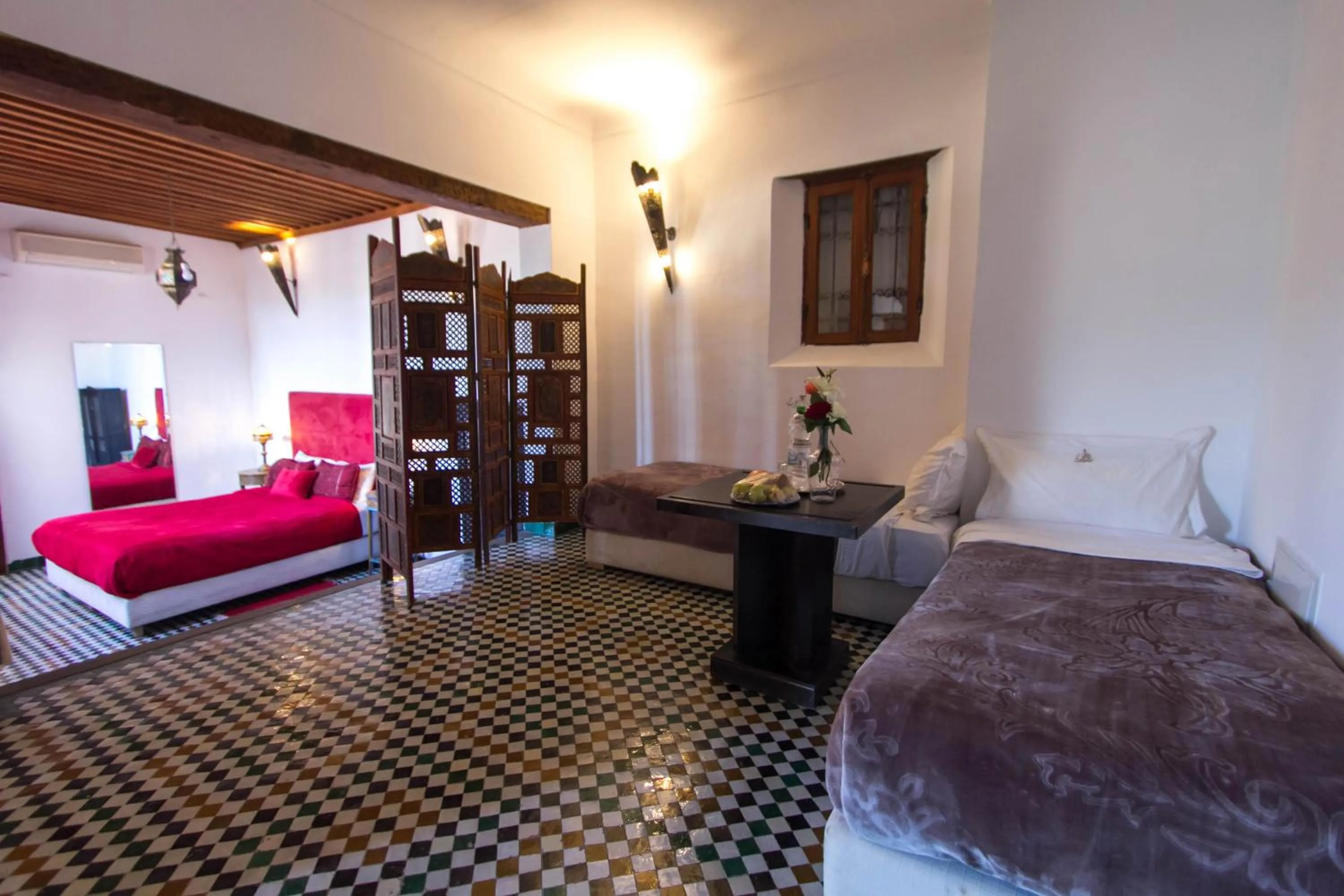 Seating area, Bed in Riad Fez Yamanda