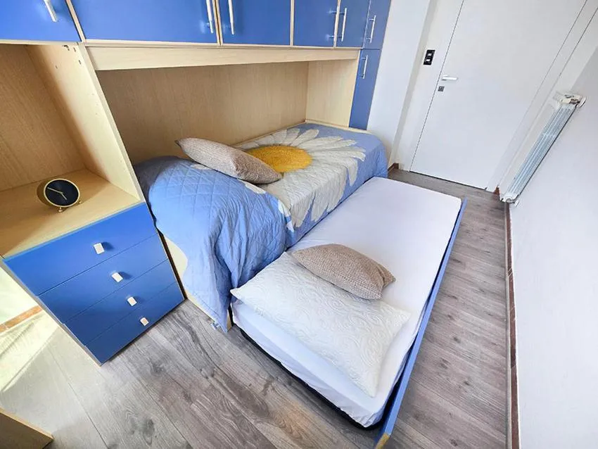 Bed in Ampio Quadrilocale 8 Pax vista mare