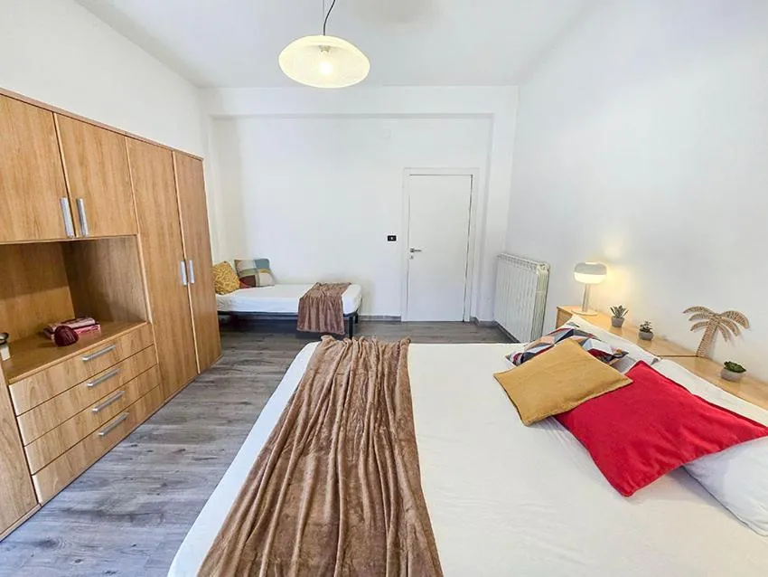 Bed in Ampio Quadrilocale 8 Pax vista mare