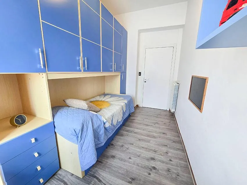Bed in Ampio Quadrilocale 8 Pax vista mare