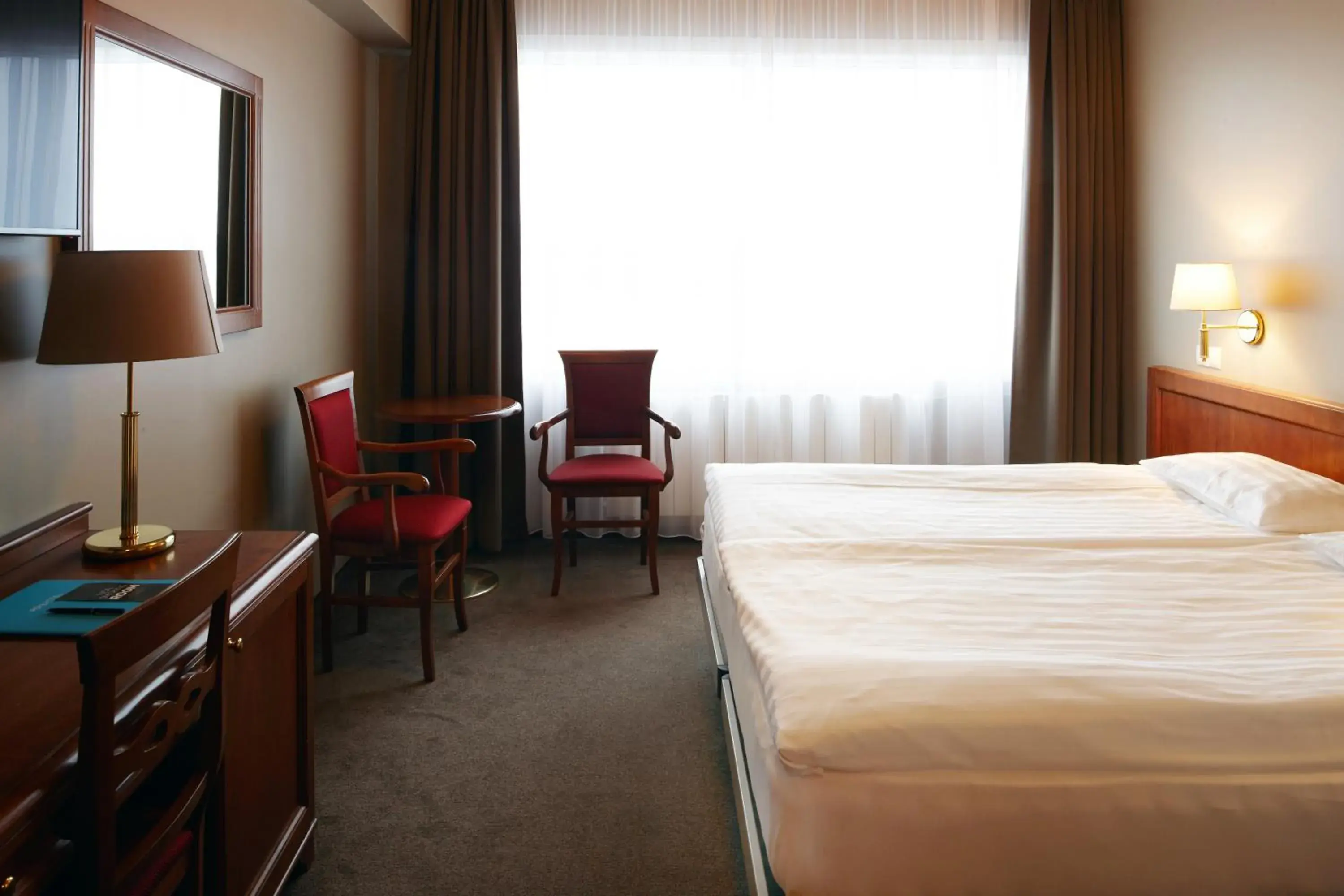 Seating area, Bed in Fosshotel Stykkisholmur Seating area, Bed in Fosshotel Stykkisholmur