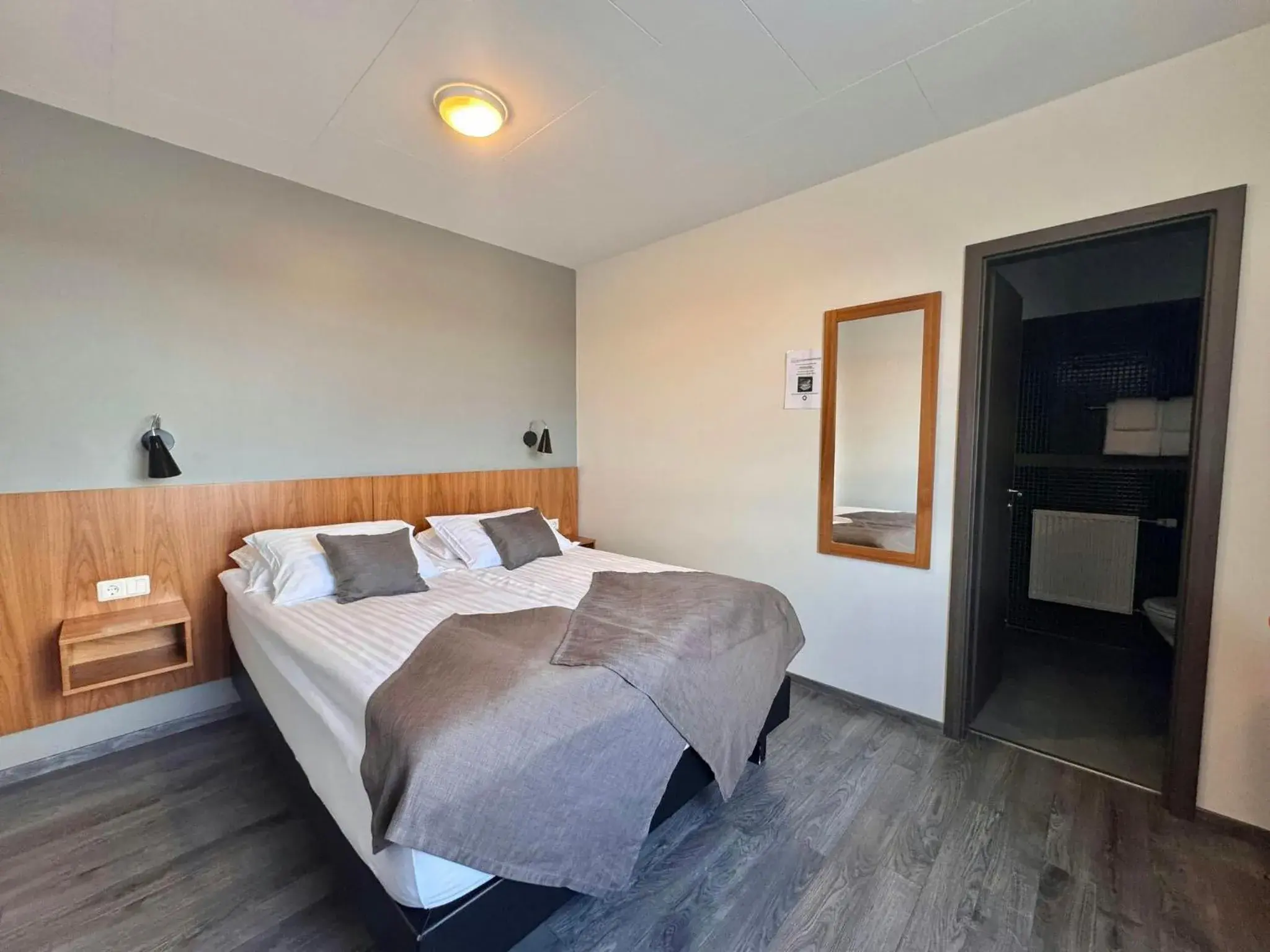 Bedroom, Bed in Hótel Valaskjálf Bedroom, Bed in Hótel Valaskjálf