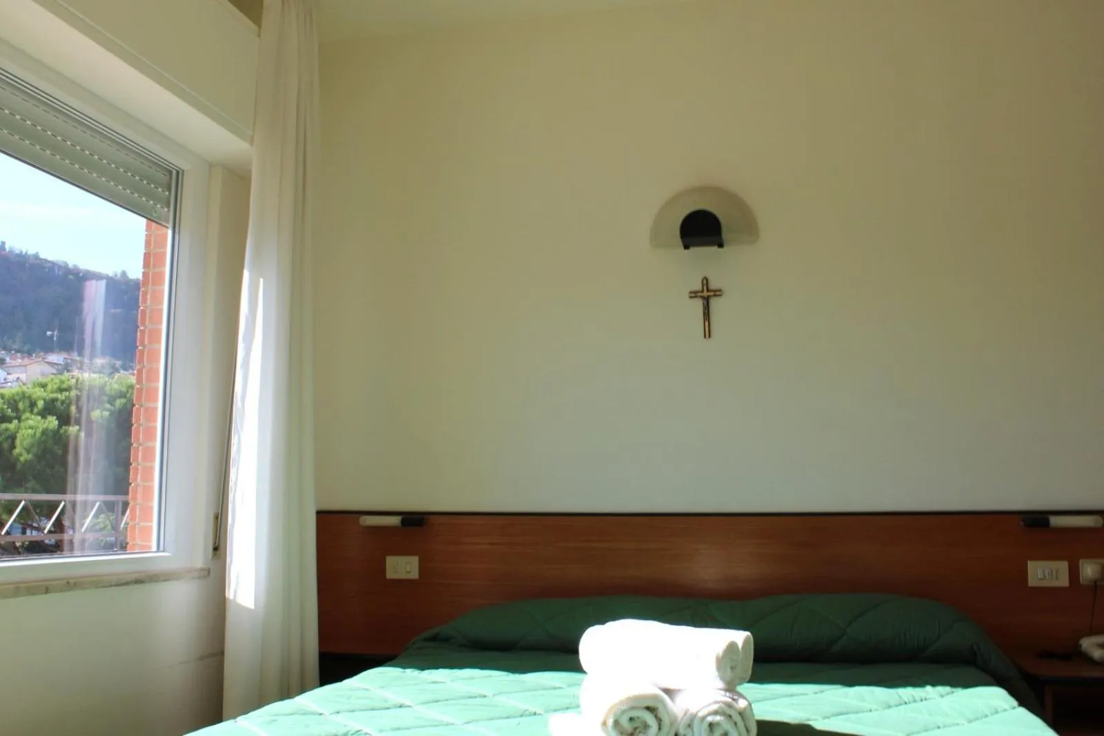 Bed in Hotel Crocenzi