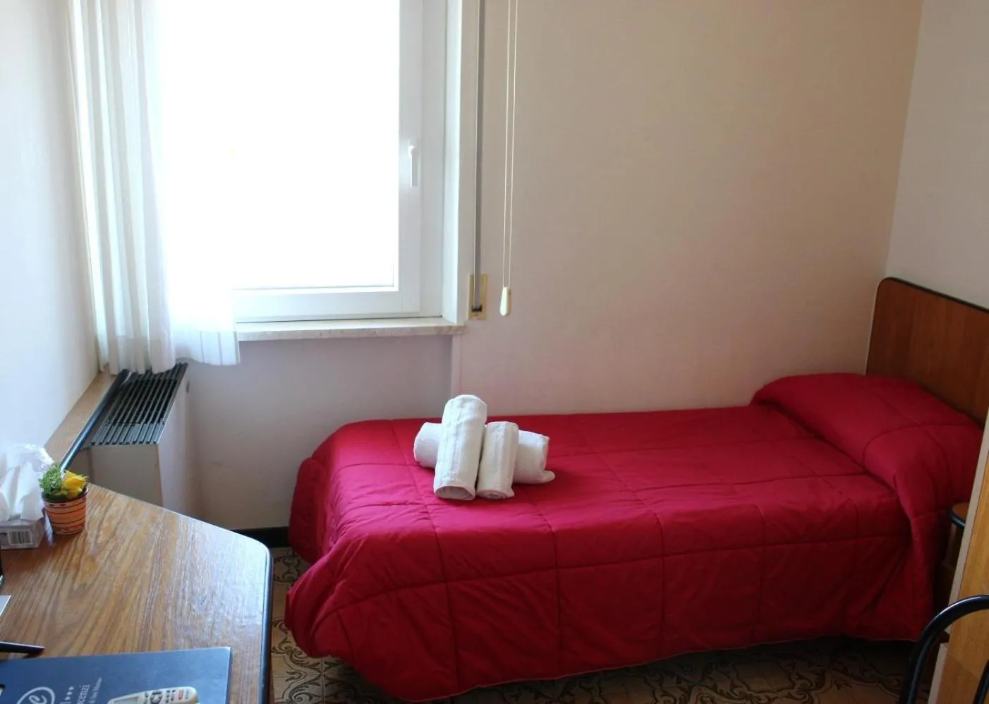 Bed in Hotel Crocenzi