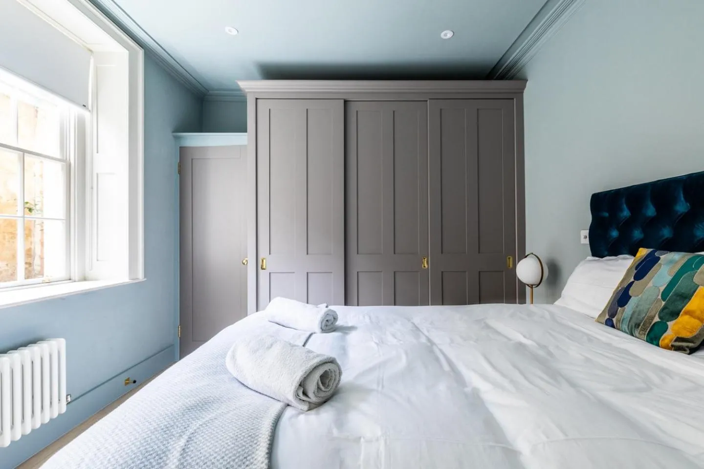 Bed in Russell House Suites