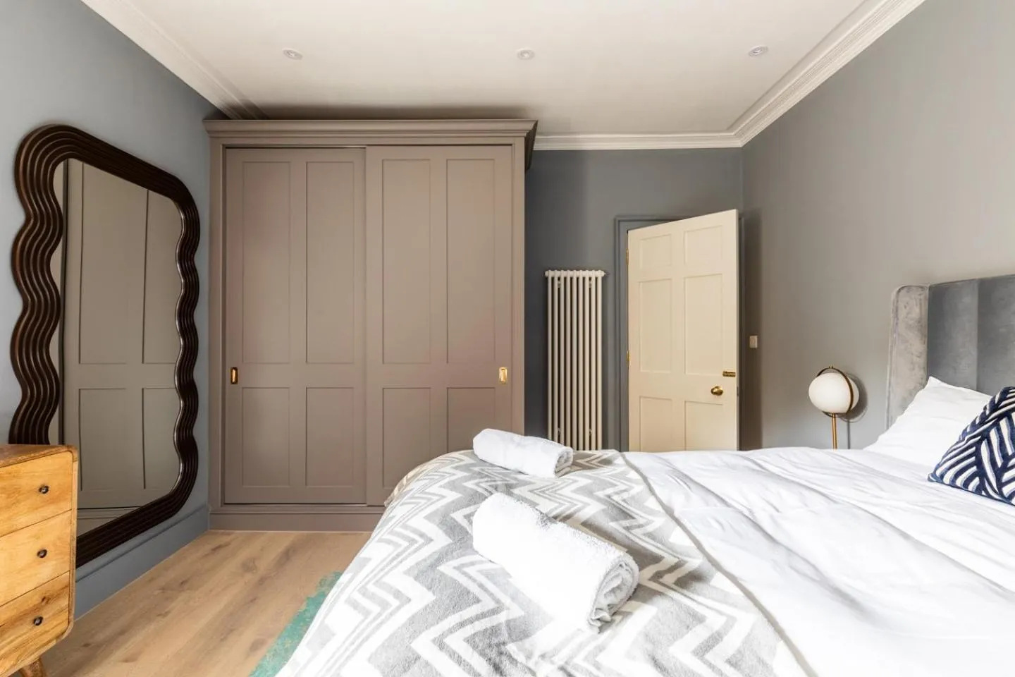 Bed in Russell House Suites