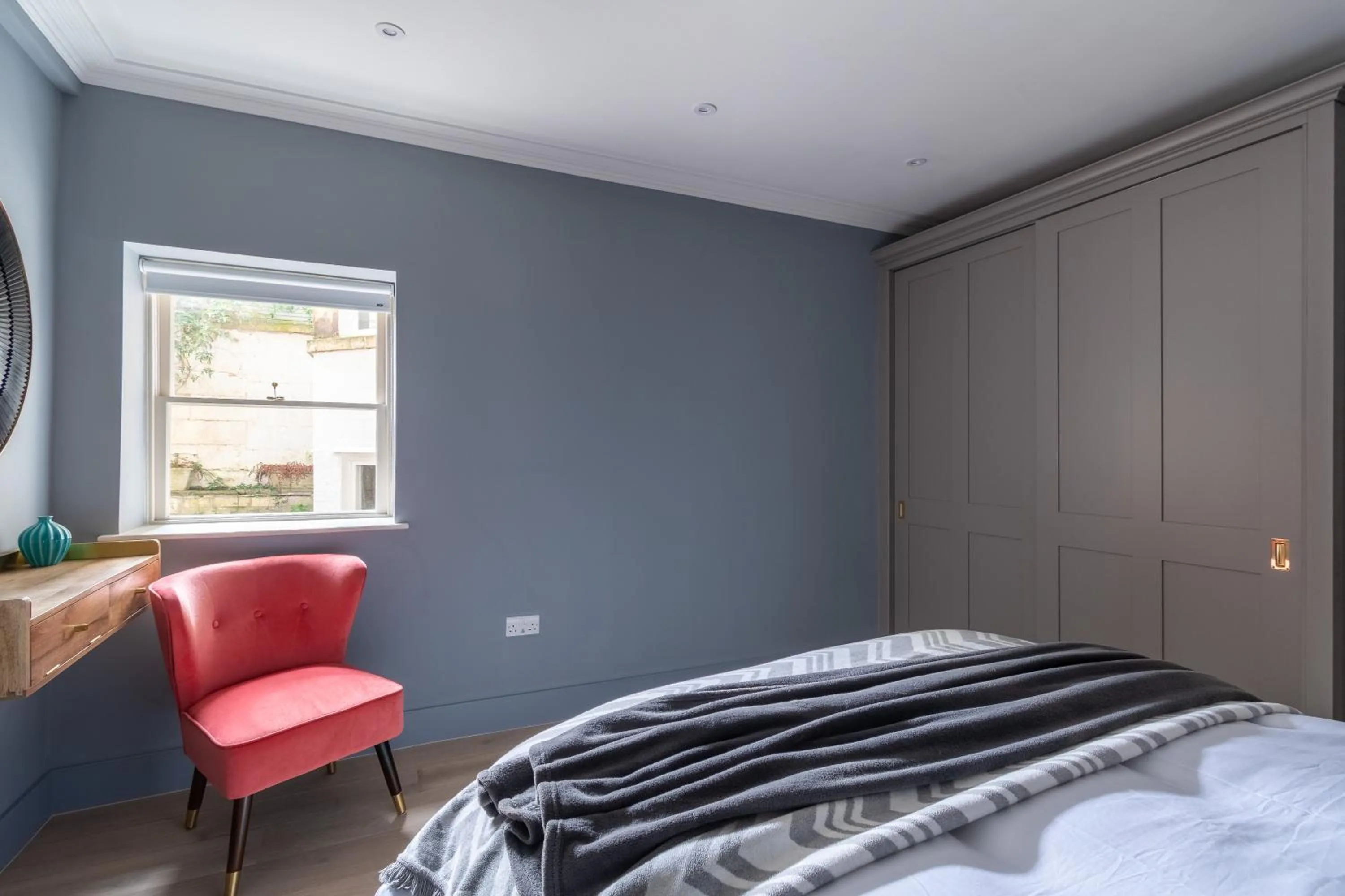 Bed in Russell House Suites