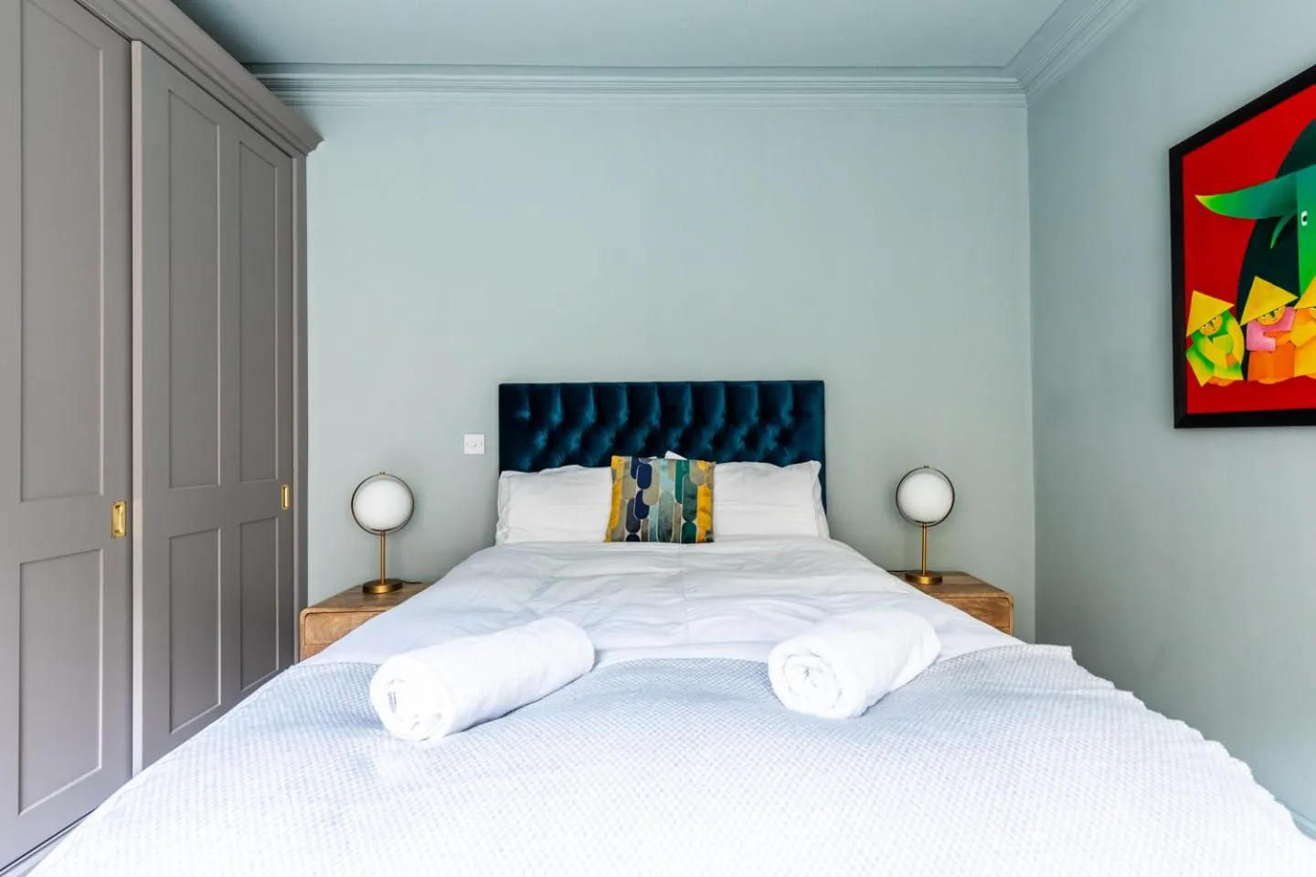 Bed in Russell House Suites