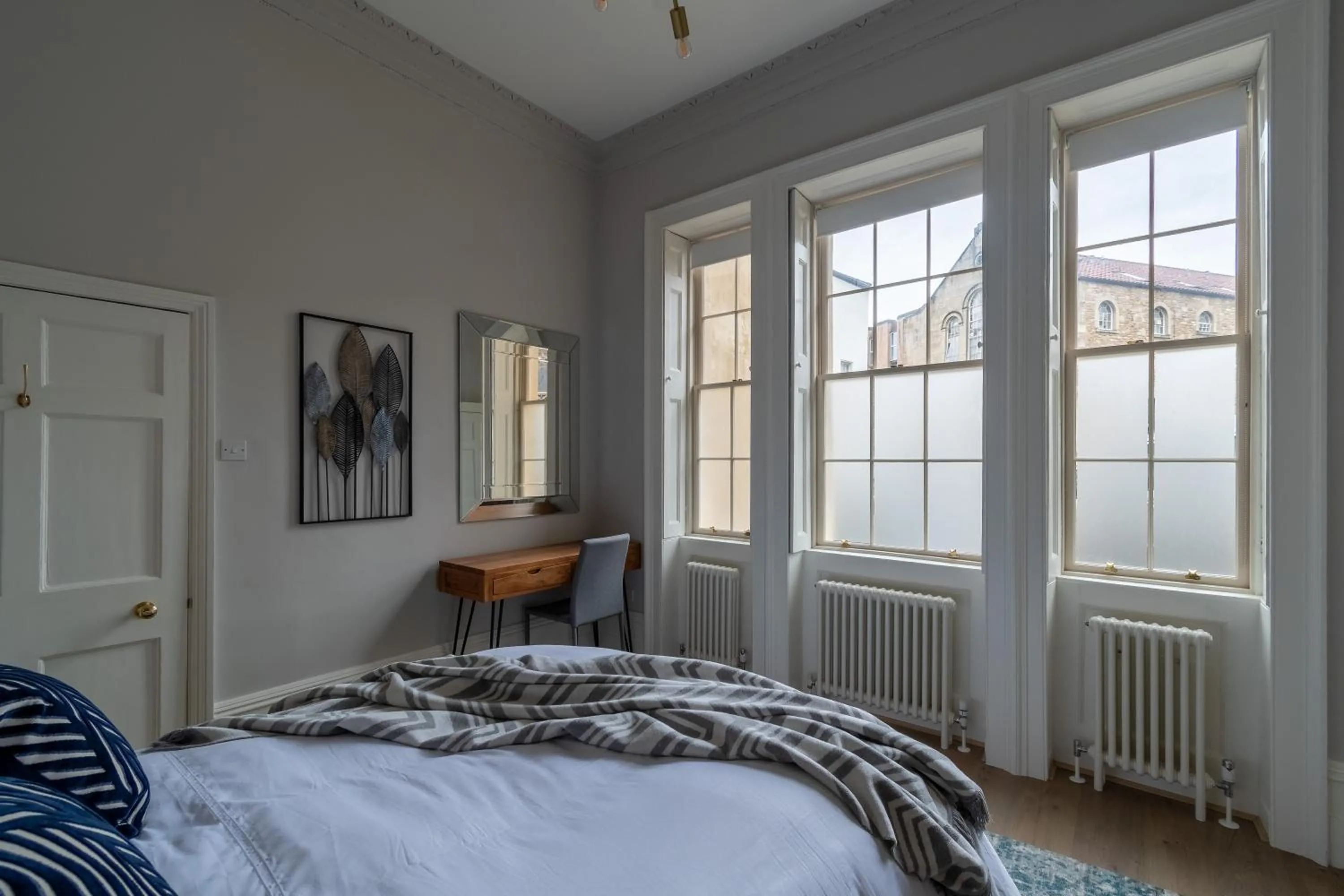 Bed in Russell House Suites