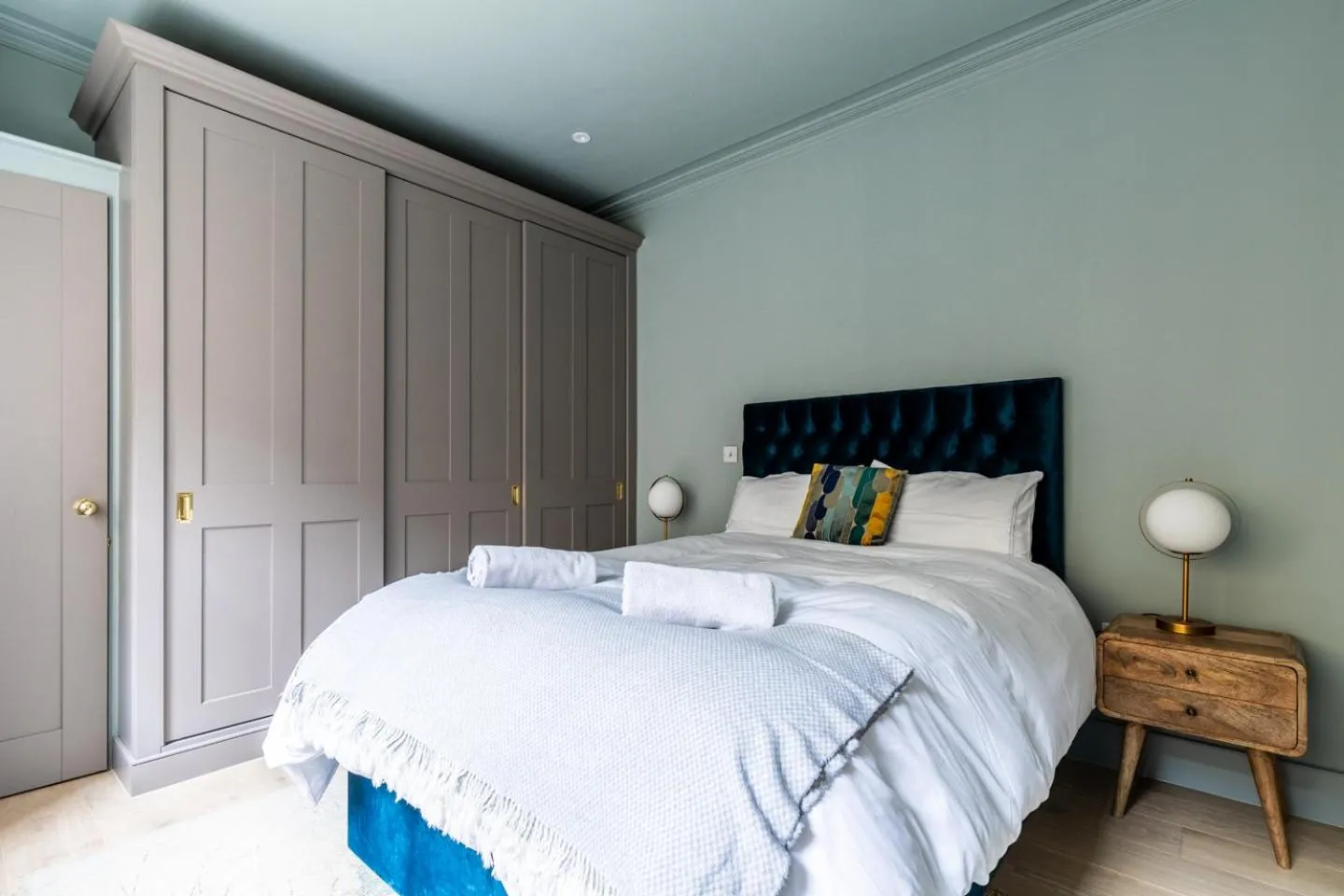 Bed in Russell House Suites