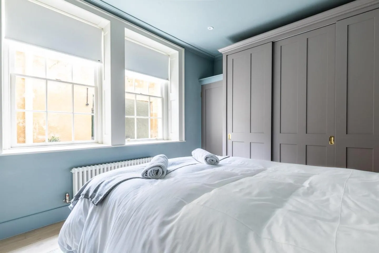 Bed in Russell House Suites