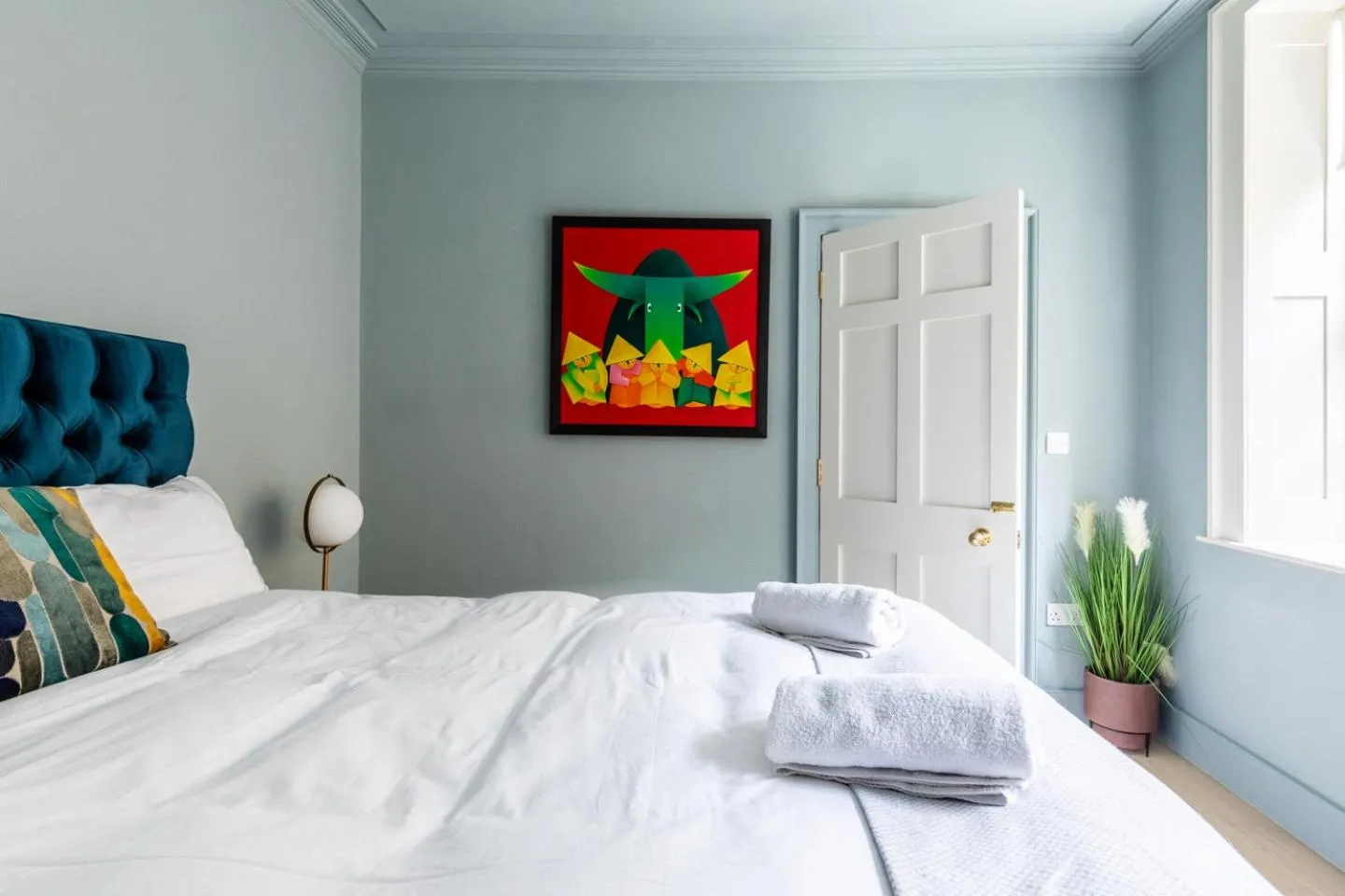 Bed in Russell House Suites