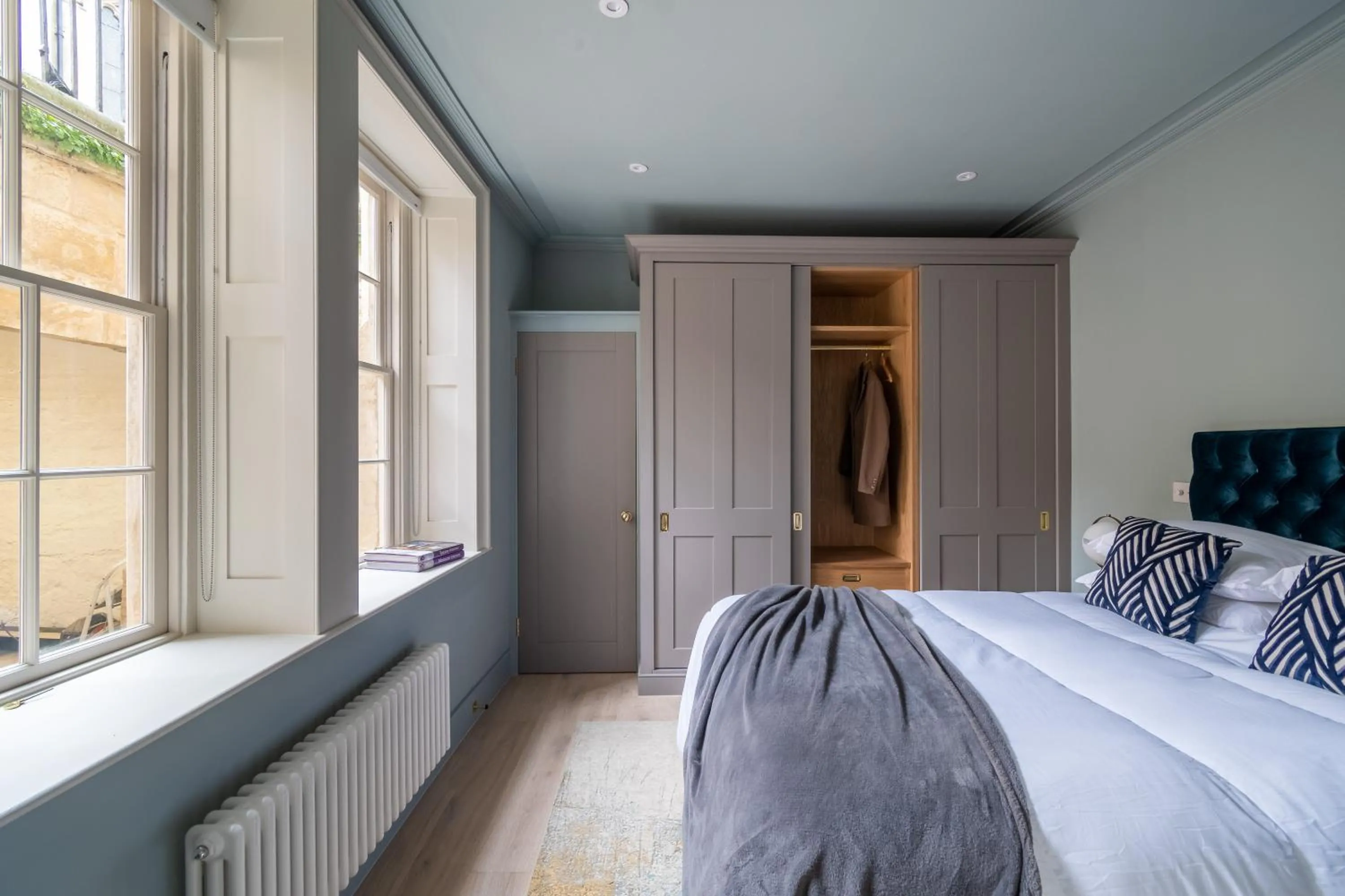 Bed in Russell House Suites