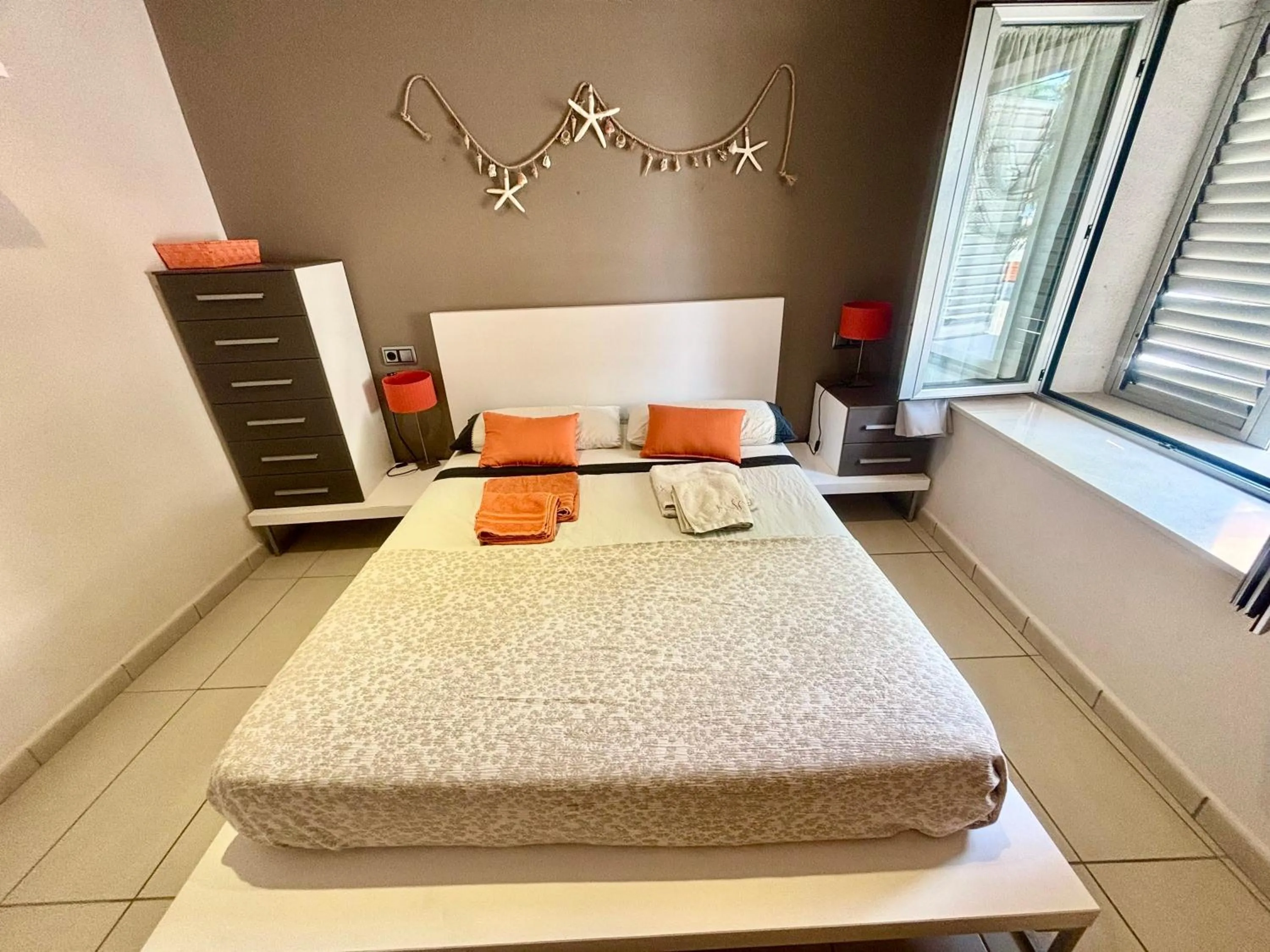 Bed in Increíble casa frente al mar , planta baja