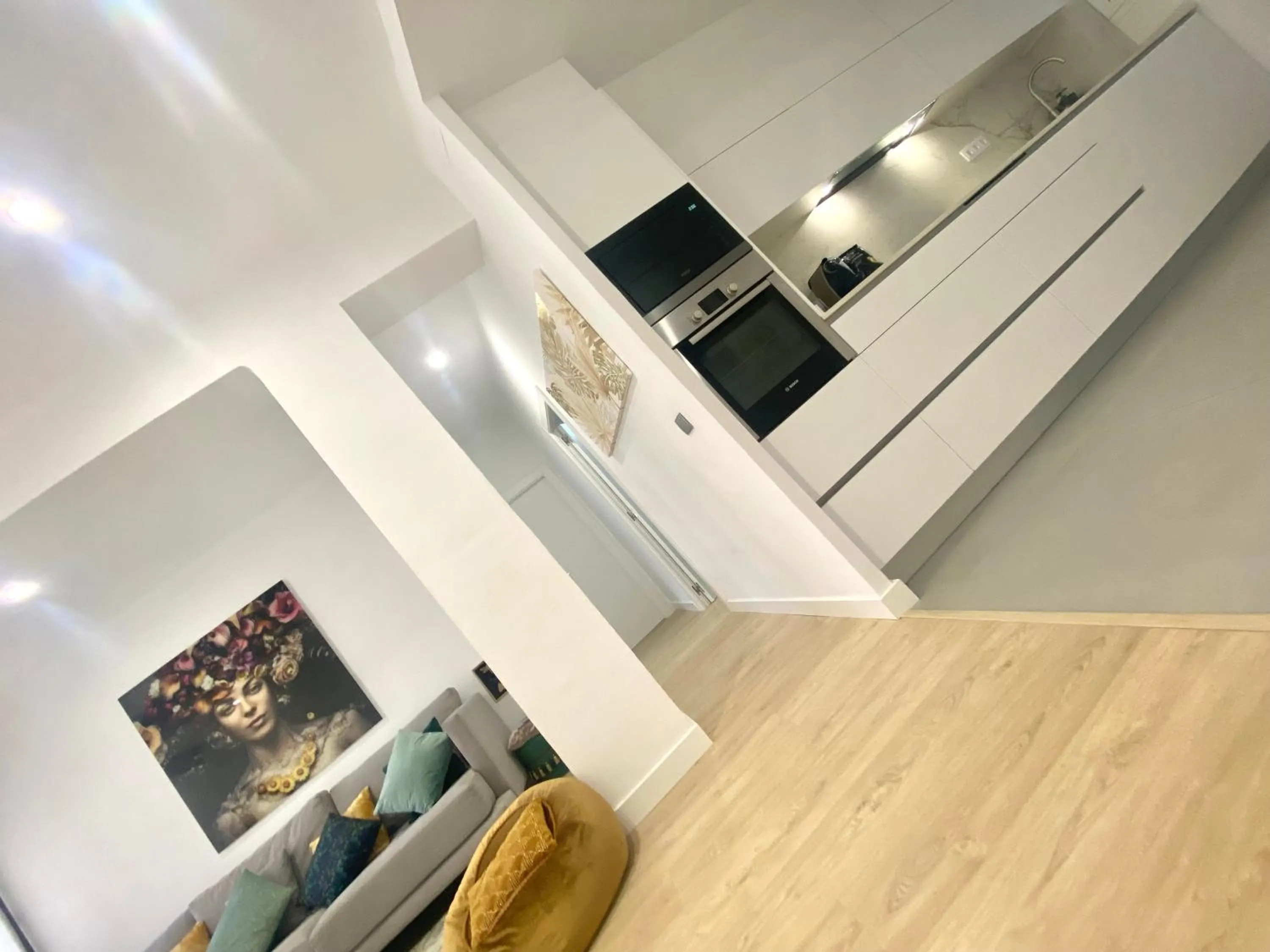 Kitchen or kitchenette in Barcelona Chic Apartments- Free Parking - 10 min BCN center by metro